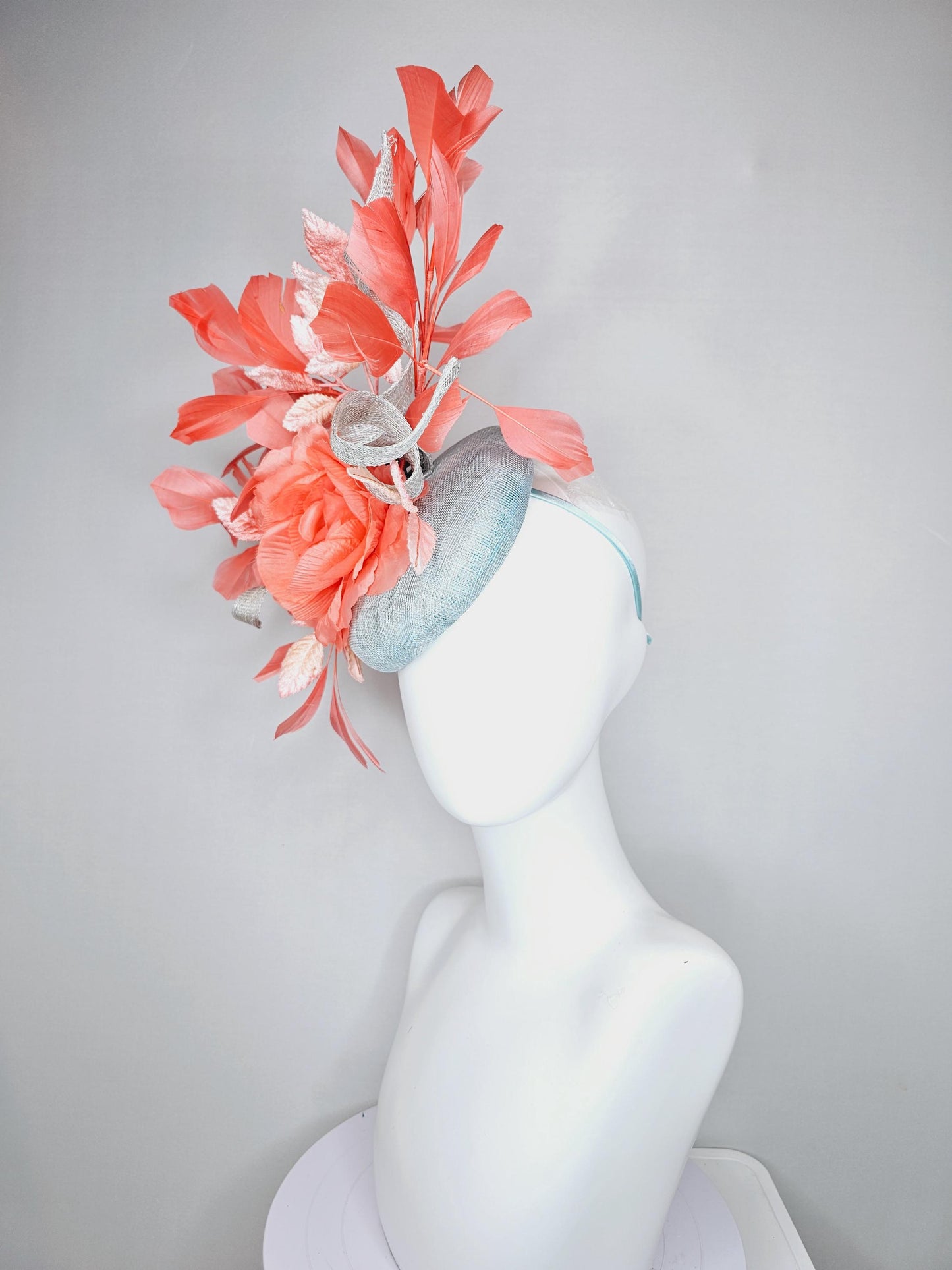 kentucky derby hat fascinator light blue sinamay w/ sinamay curls, coral peach orange satin flower, ombre peach leaves,coral orange feathers