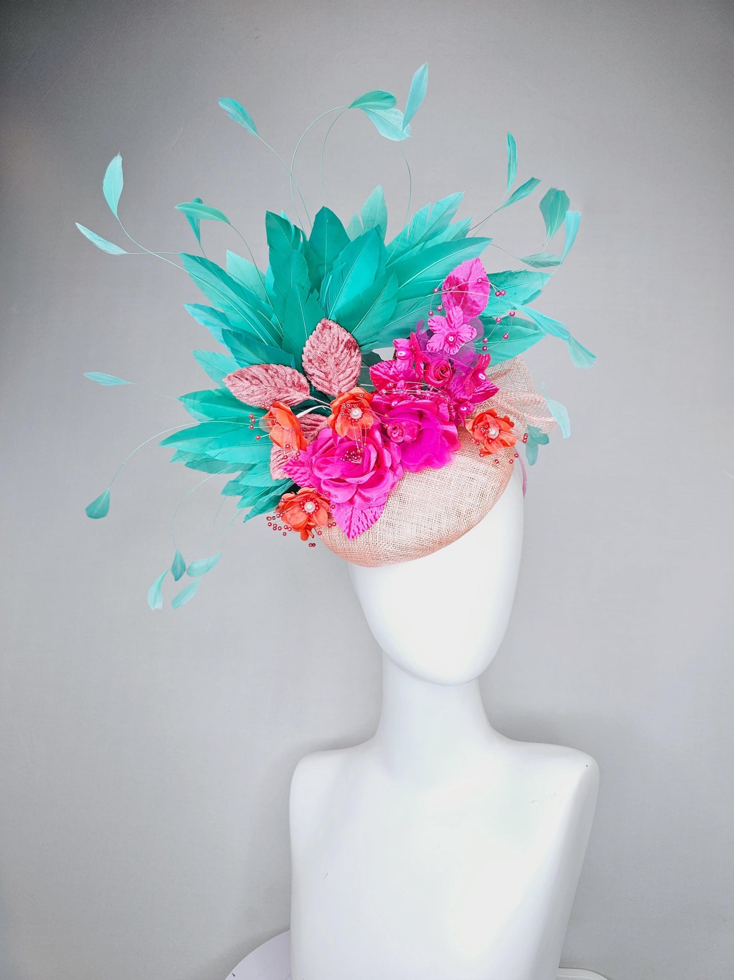 kentucky derby hat fascinator light pink sinamay with mint green branching feathers,bright pink coral orange satin flowers,blush pink leaves