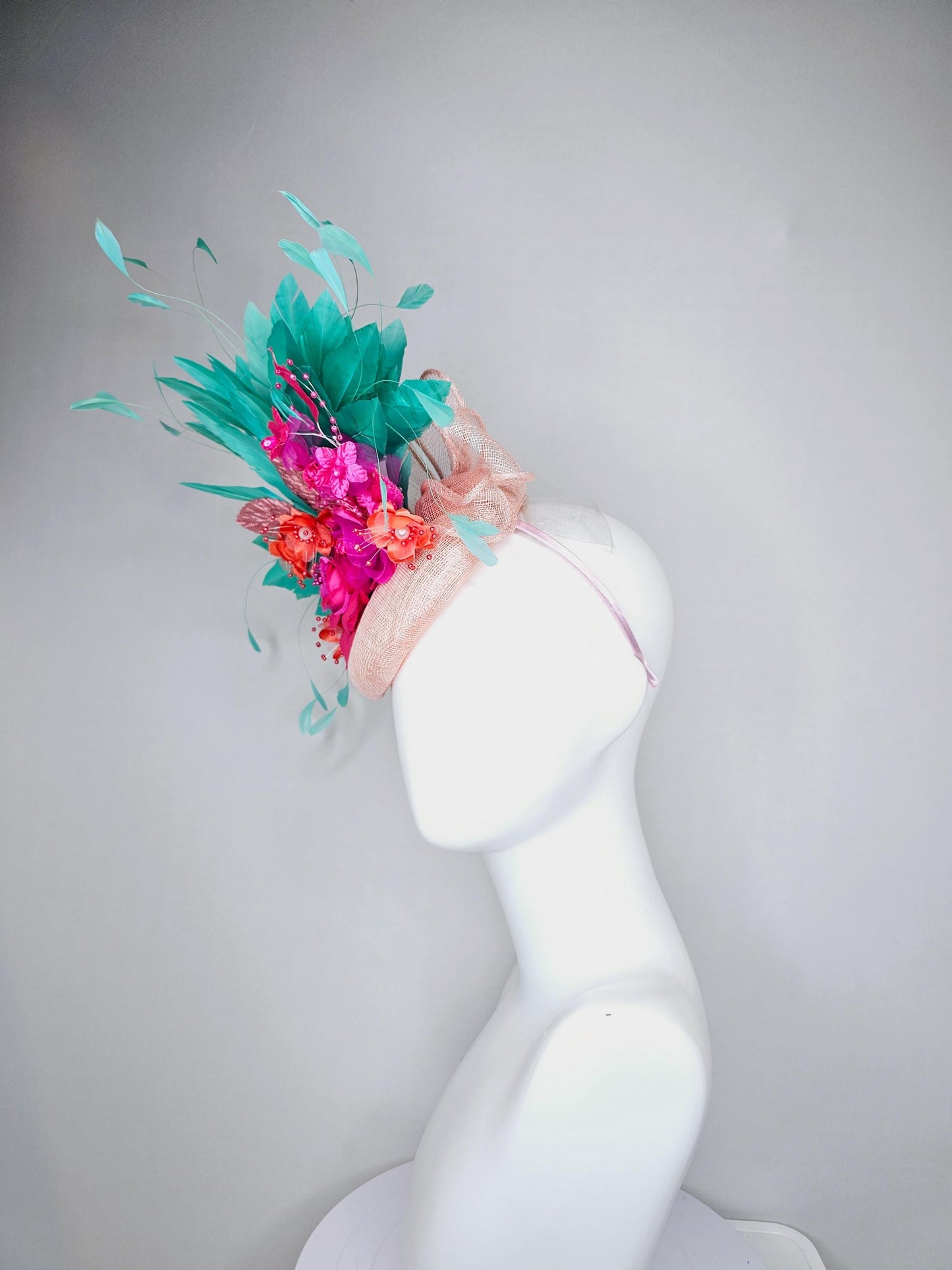 kentucky derby hat fascinator light pink sinamay with mint green branching feathers,bright pink coral orange satin flowers,blush pink leaves