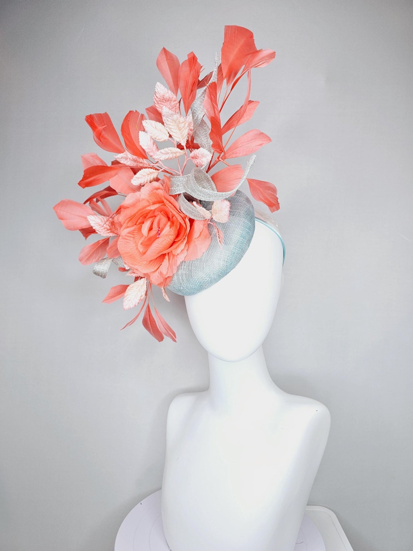 kentucky derby hat fascinator light blue sinamay w/ sinamay curls, coral peach orange satin flower, ombre peach leaves,coral orange feathers