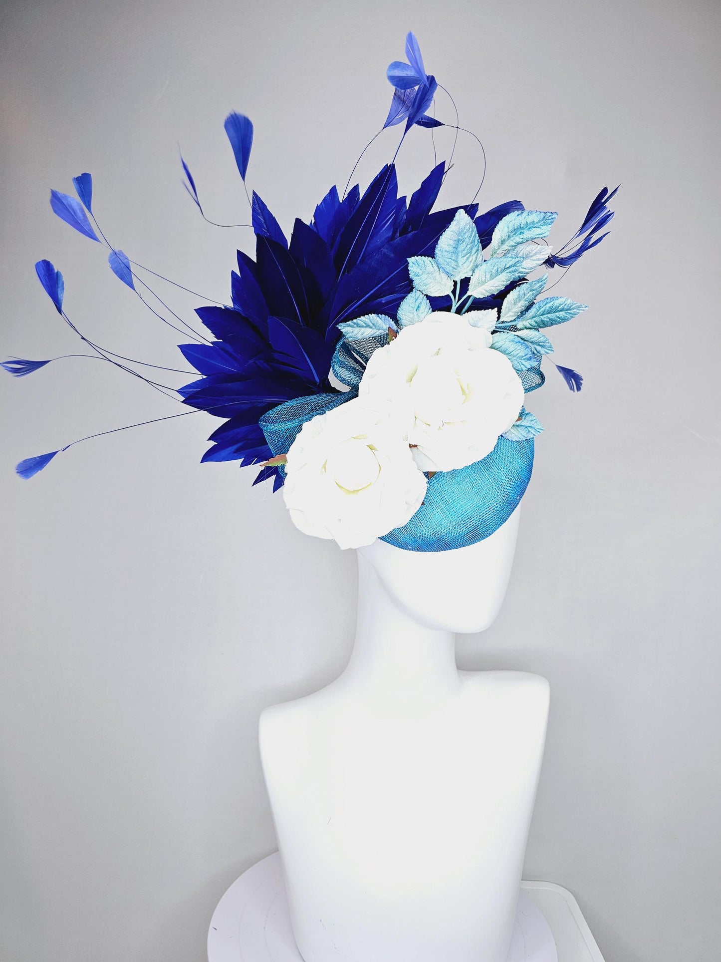 kentucky derby hat fascinator blue sinamay with midnight navy blue branching feathers,light blue ombre leaves,white satin silk rose flowers