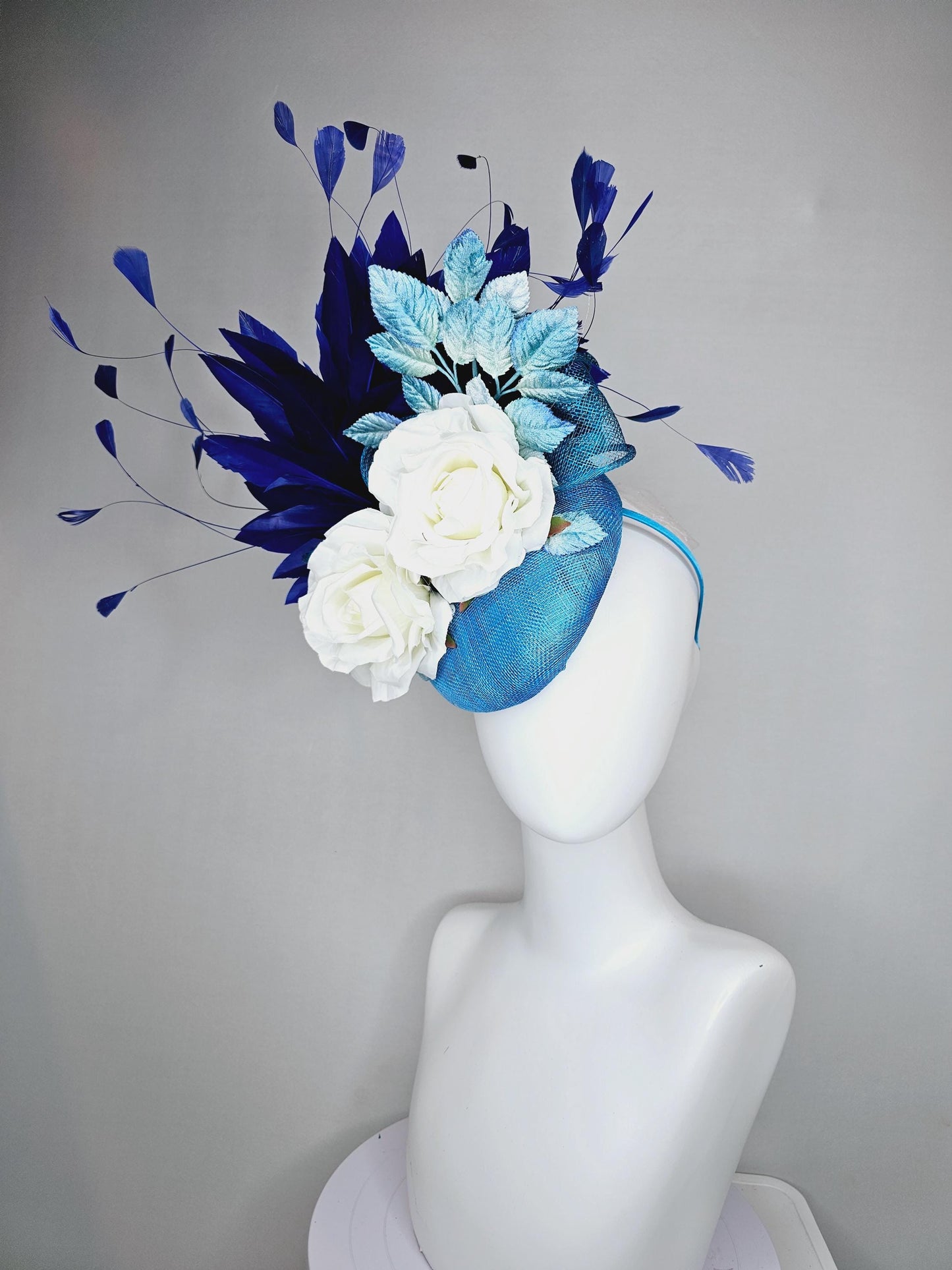 kentucky derby hat fascinator blue sinamay with midnight navy blue branching feathers,light blue ombre leaves,white satin silk rose flowers