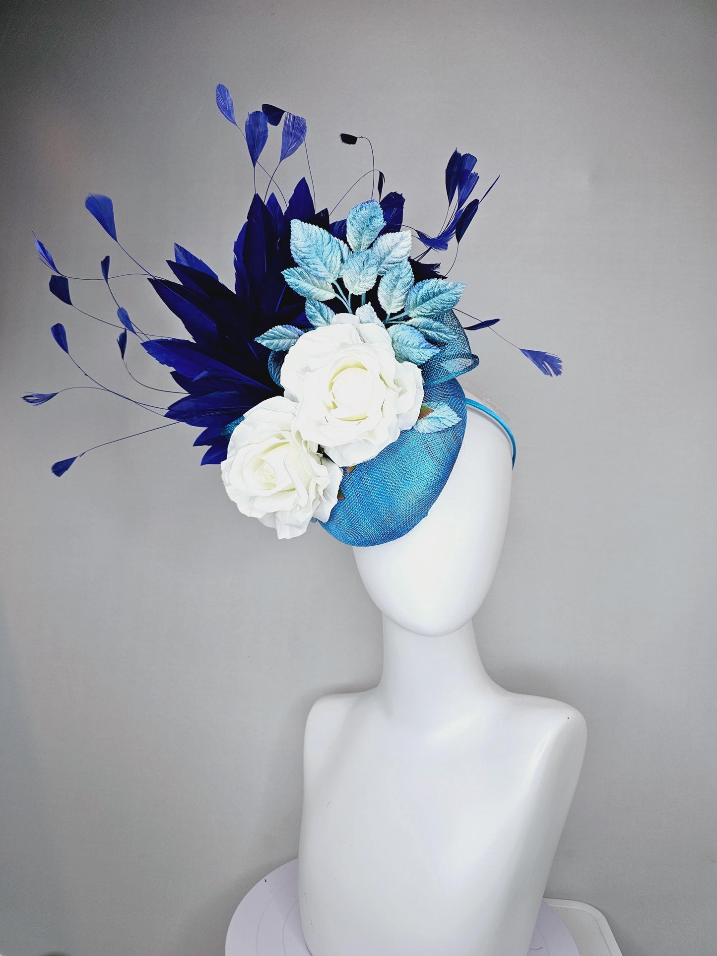 kentucky derby hat fascinator blue sinamay with midnight navy blue branching feathers,light blue ombre leaves,white satin silk rose flowers