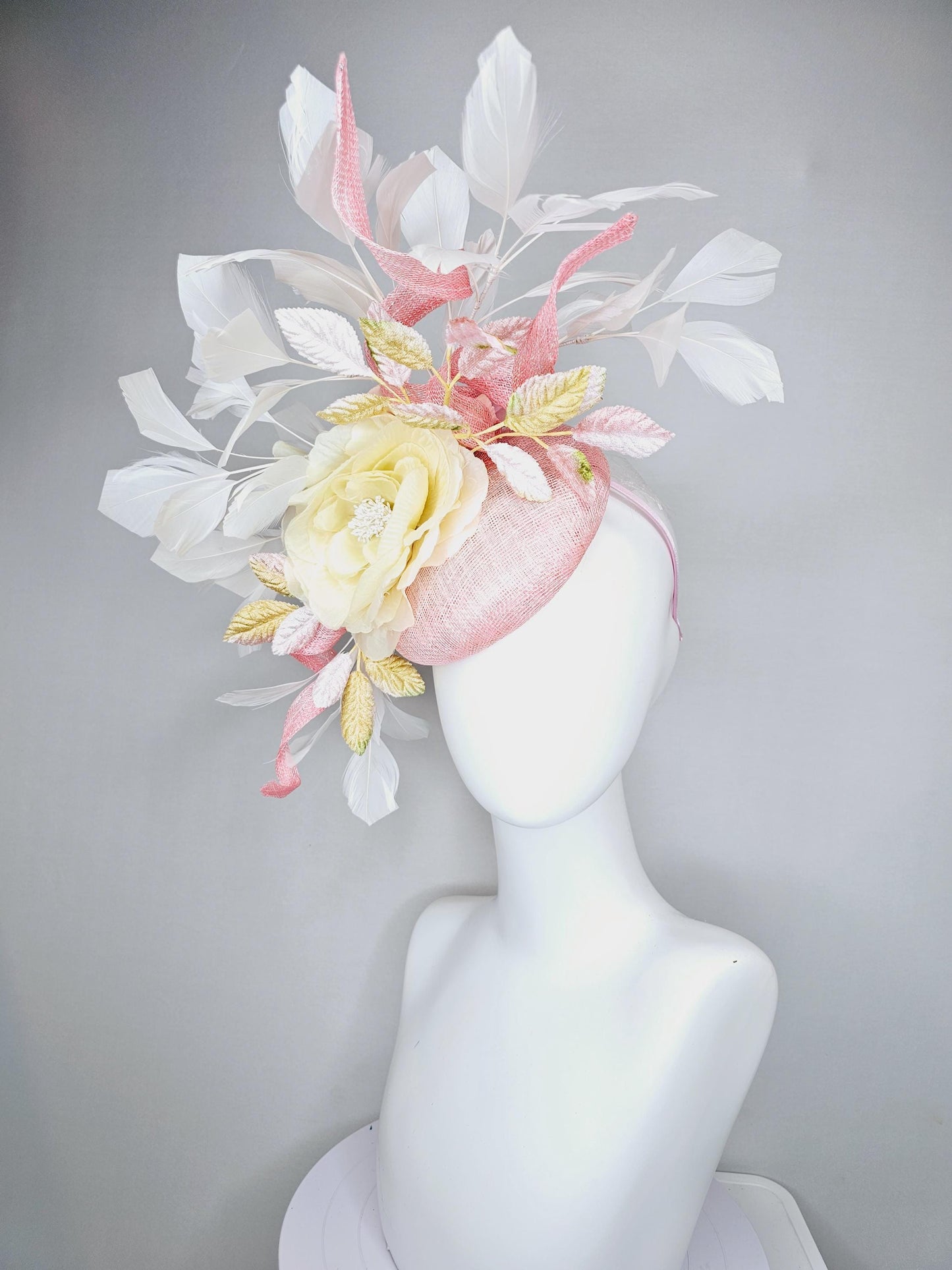 kentucky derby hat fascinator light pink sinamay with curls,white branching feathers,light pastel yellow satin silk rose,yellow pink leaves