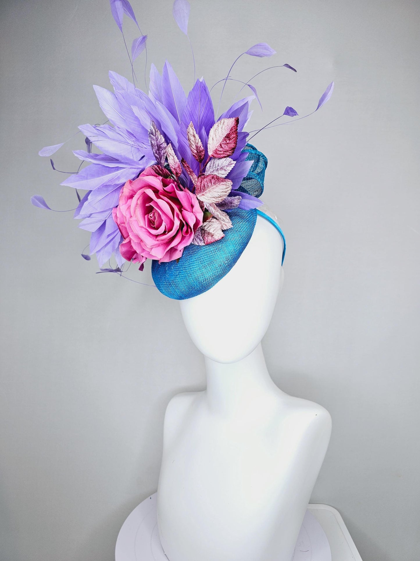 kentucky derby hat fascinator bright blue sinamay,lavender purple branching feathers,pink satin silk rose,pink beige ombre velvet leaves