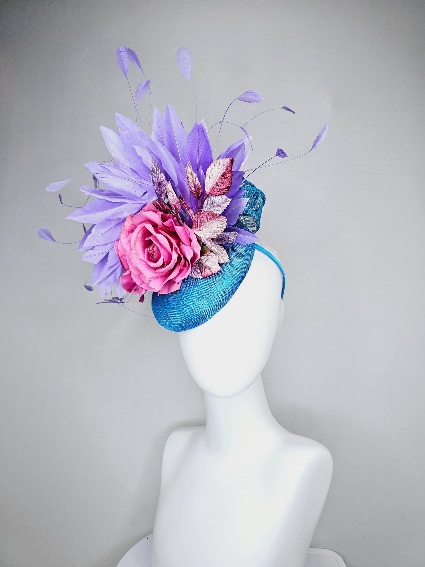 kentucky derby hat fascinator bright blue sinamay,lavender purple branching feathers,pink satin silk rose,pink beige ombre velvet leaves