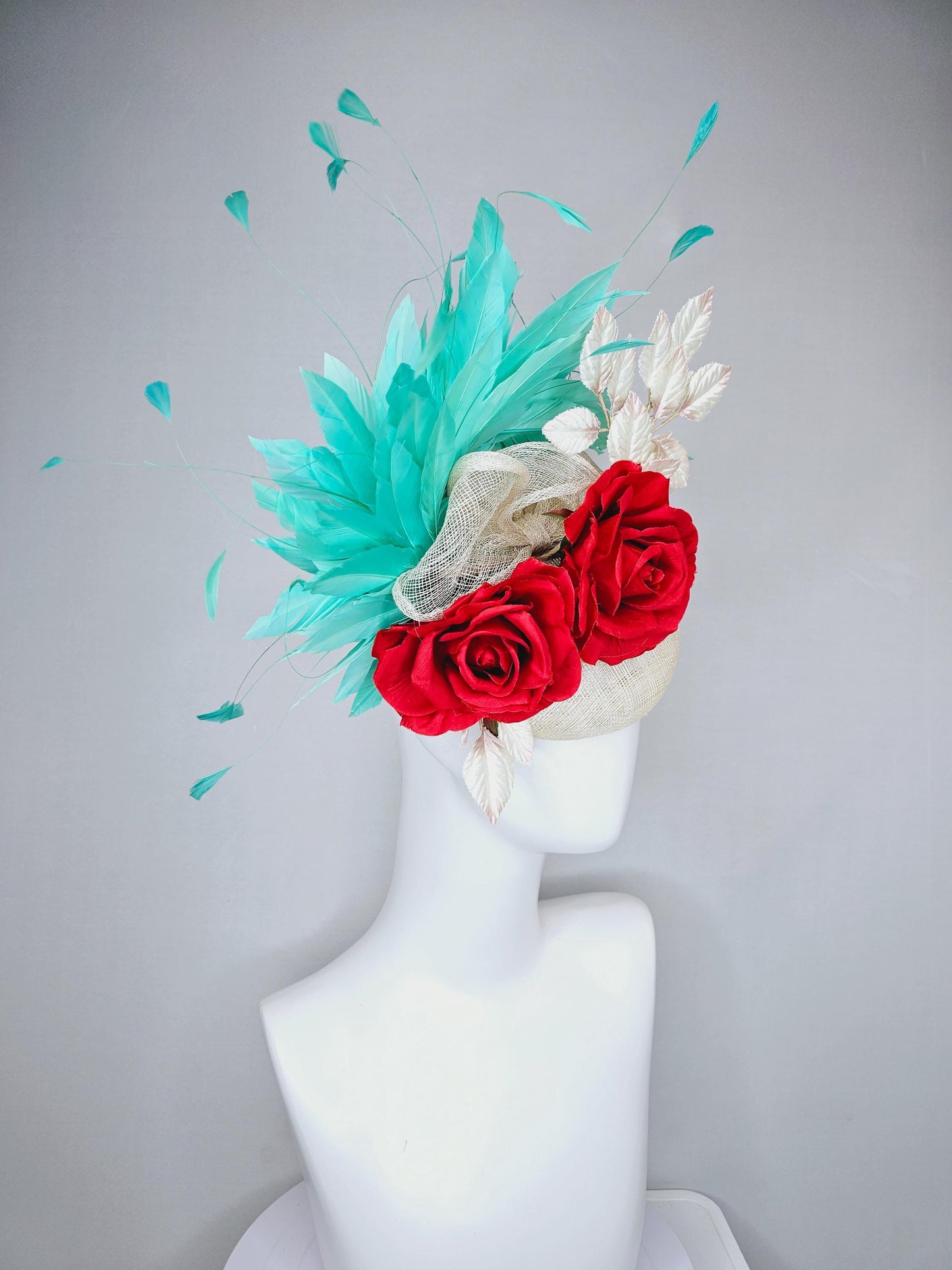 kentucky derby hat fascinator white ivory sinamay with white velvet leaves,aqua green blue branching feathers,bright red satin silk roses