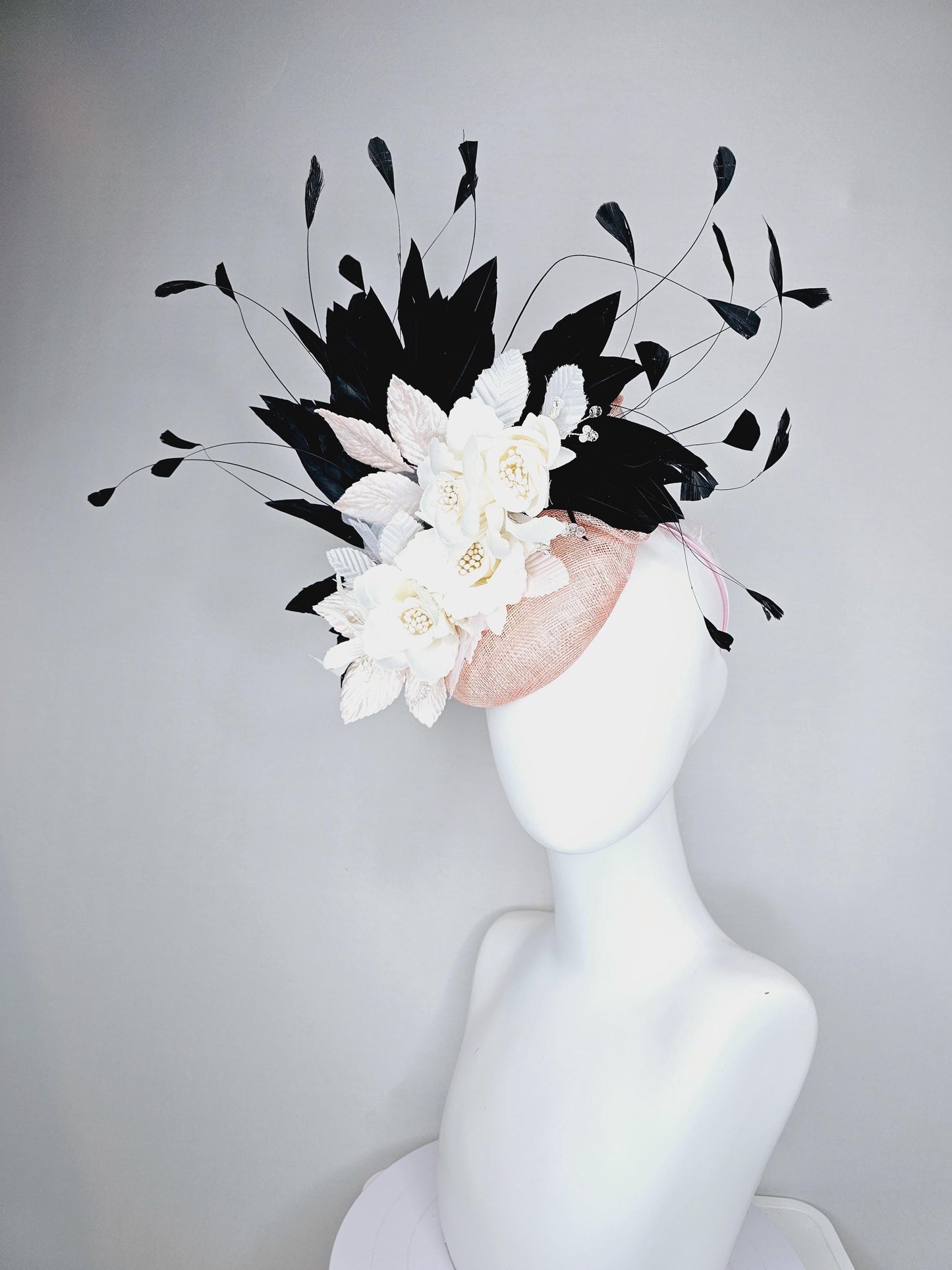 kentucky derby hat fascinator light pink sinamay with ivory white satin silk flowers, light pink white leaves, black branching feathers