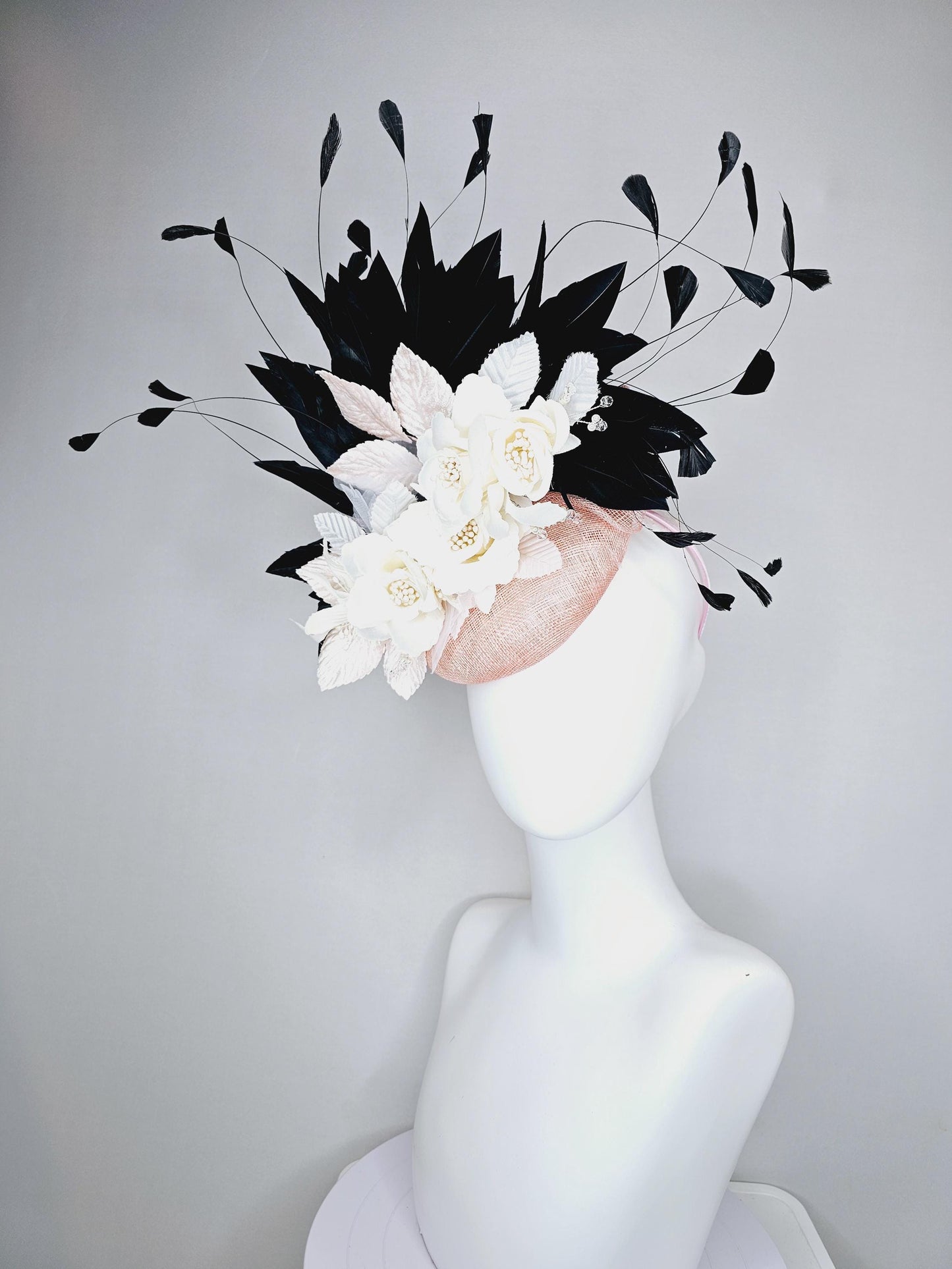 kentucky derby hat fascinator light pink sinamay with ivory white satin silk flowers, light pink white leaves, black branching feathers