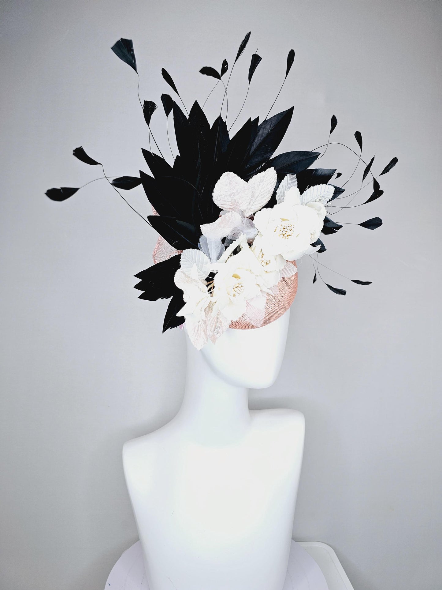 kentucky derby hat fascinator light pink sinamay with ivory white satin silk flowers, light pink white leaves, black branching feathers