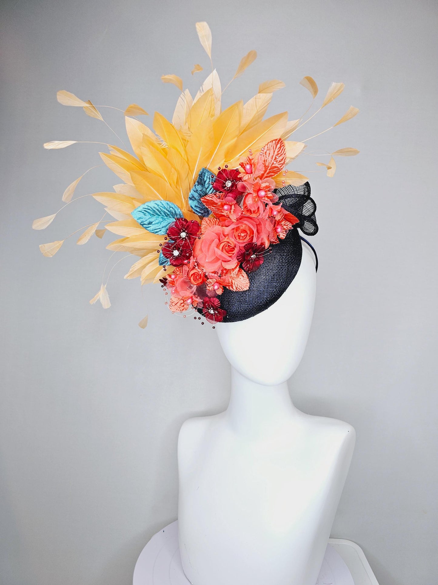 kentucky derby hat fascinator black sinamay, apricot orange yellow feathers, coral orange wine red satin flowers, sky blue coral leaves