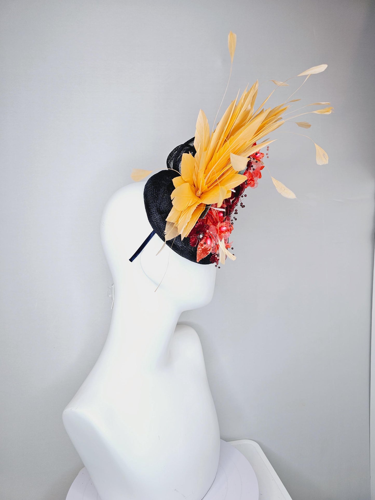 kentucky derby hat fascinator black sinamay, apricot orange yellow feathers, coral orange wine red satin flowers, sky blue coral leaves