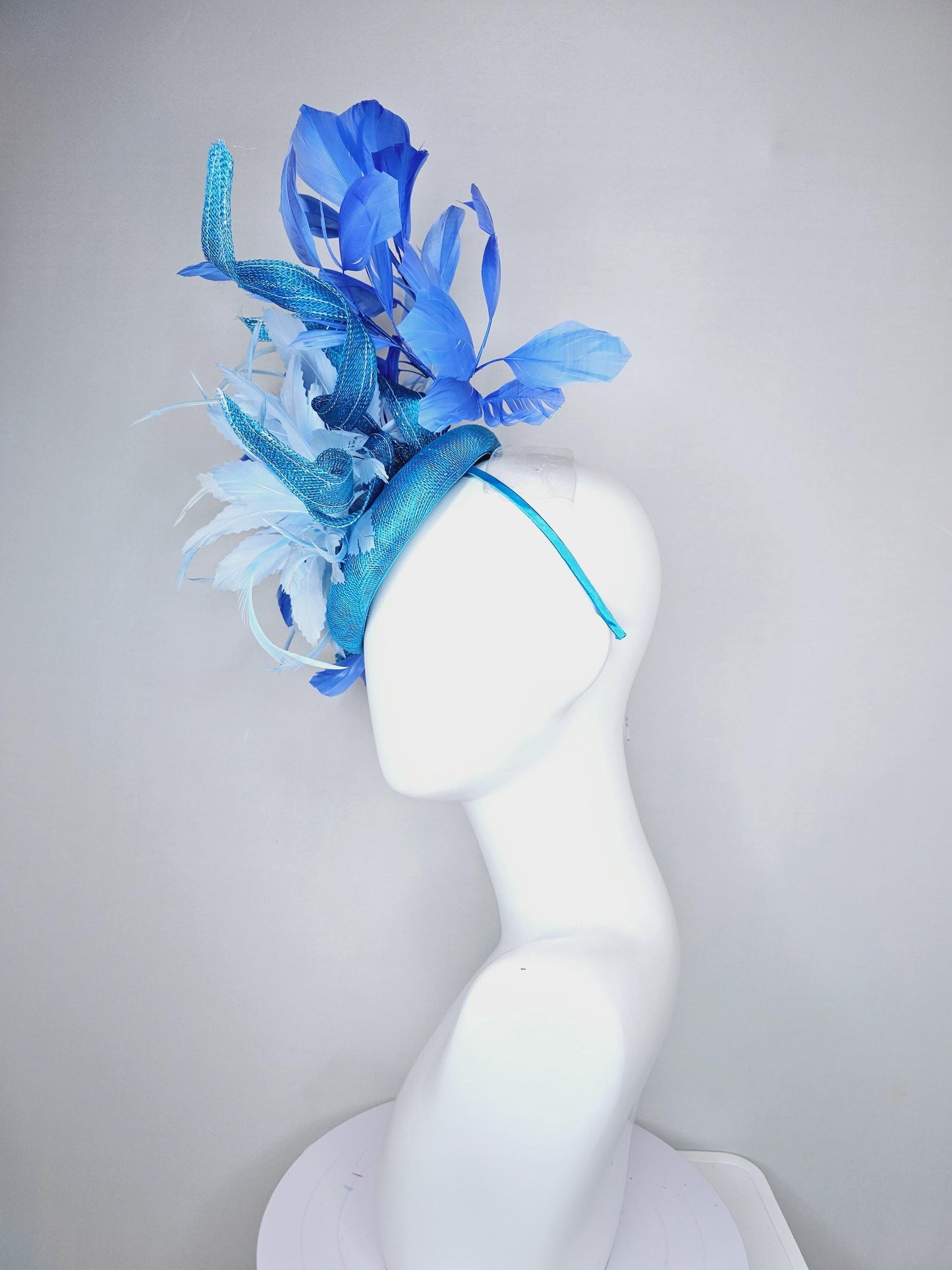 kentucky derby hat fascinator blue sinamay with curls and royal blue branching feathers,light baby blue large feather flower