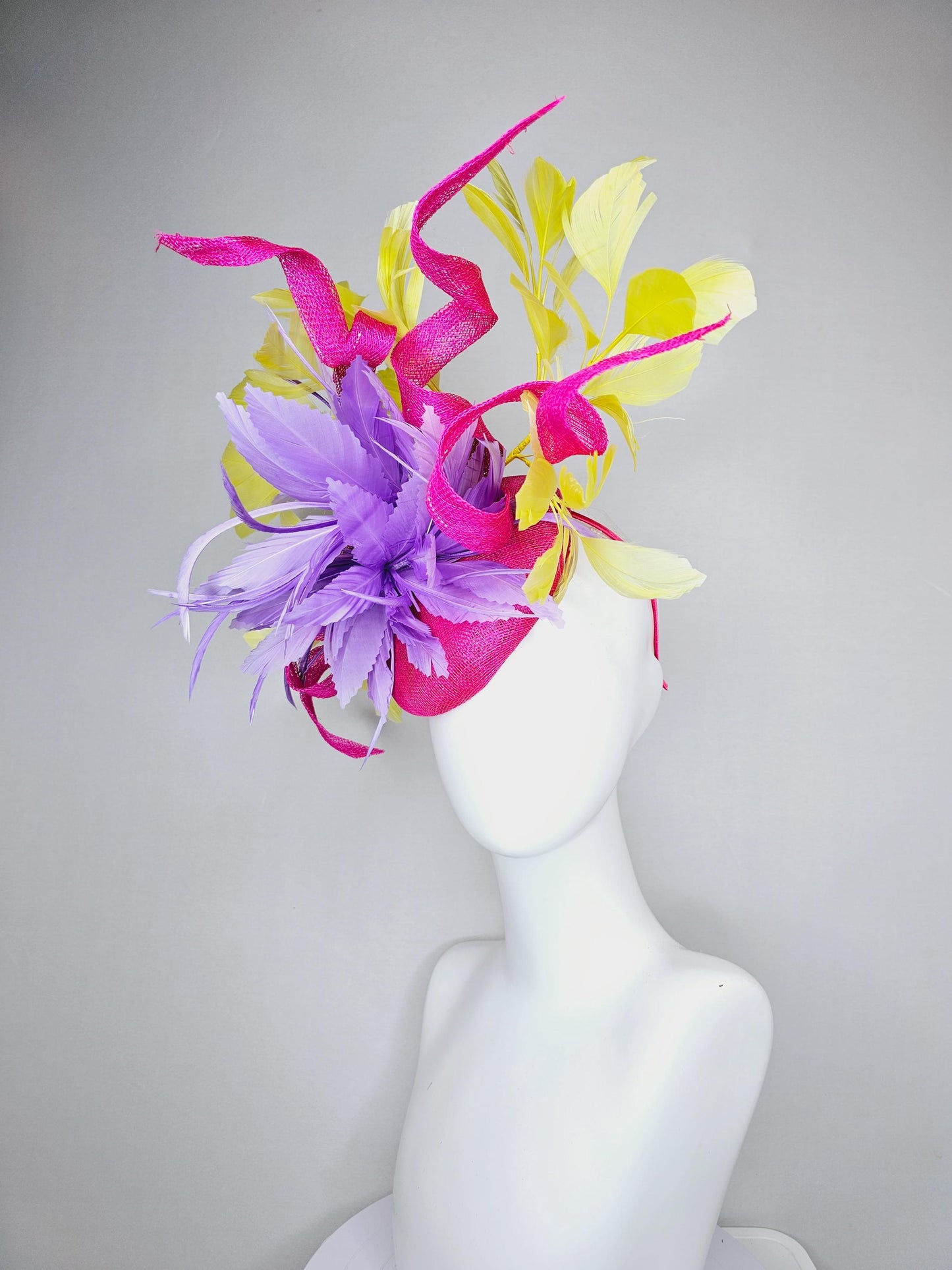 kentucky derby hat fascinator hot pink sinamay with curls and bright yellow branching feathers and purple feather flower