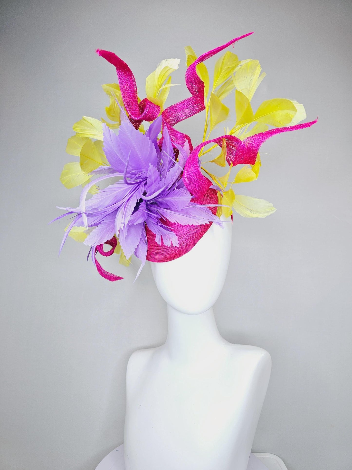 kentucky derby hat fascinator hot pink sinamay with curls and bright yellow branching feathers and purple feather flower