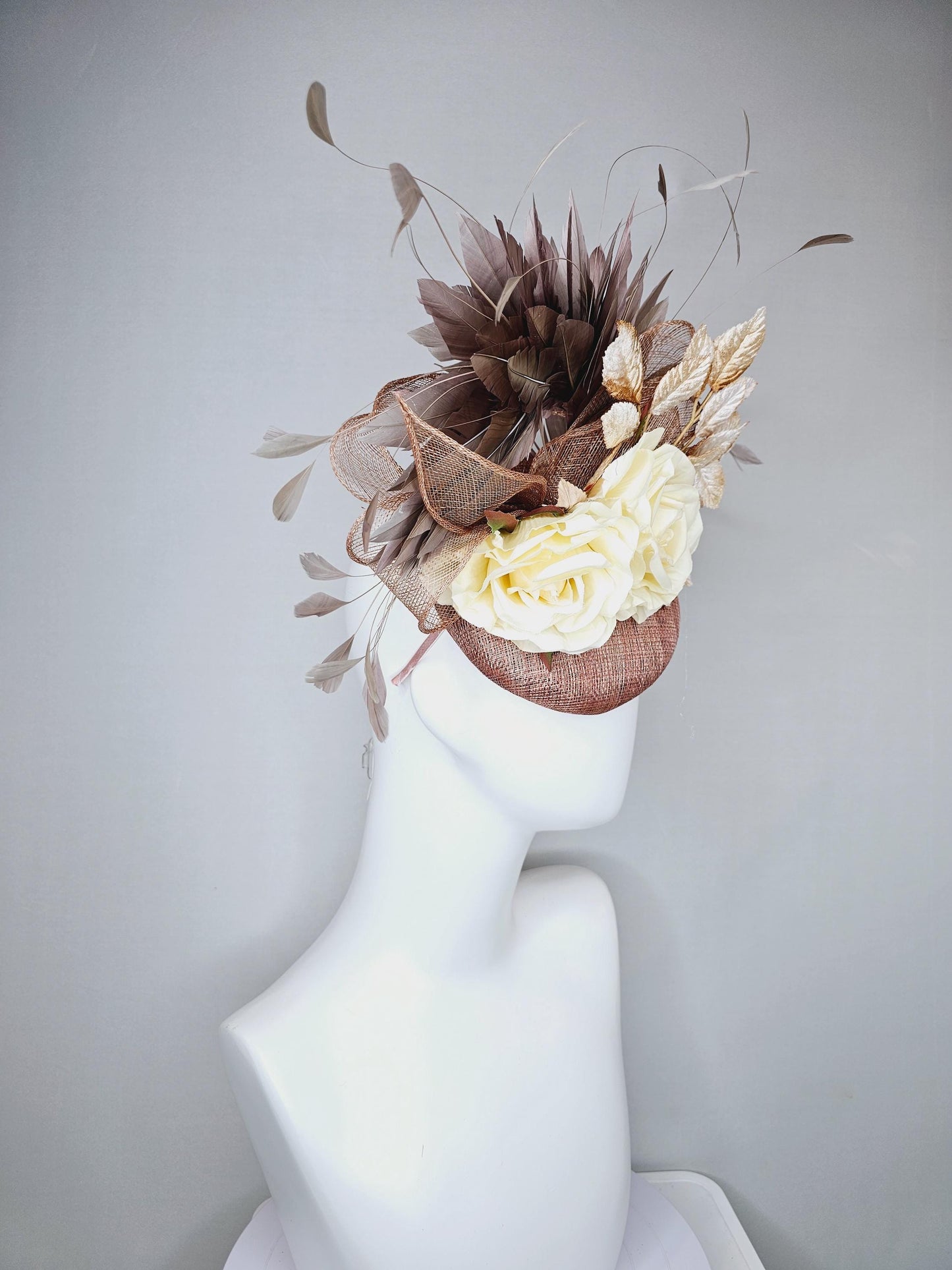 kentucky derby hat fascinator dusty pink sinamay,neutral taupe brown gray branching feathers,gold tan cream leaves,cream satin silk roses