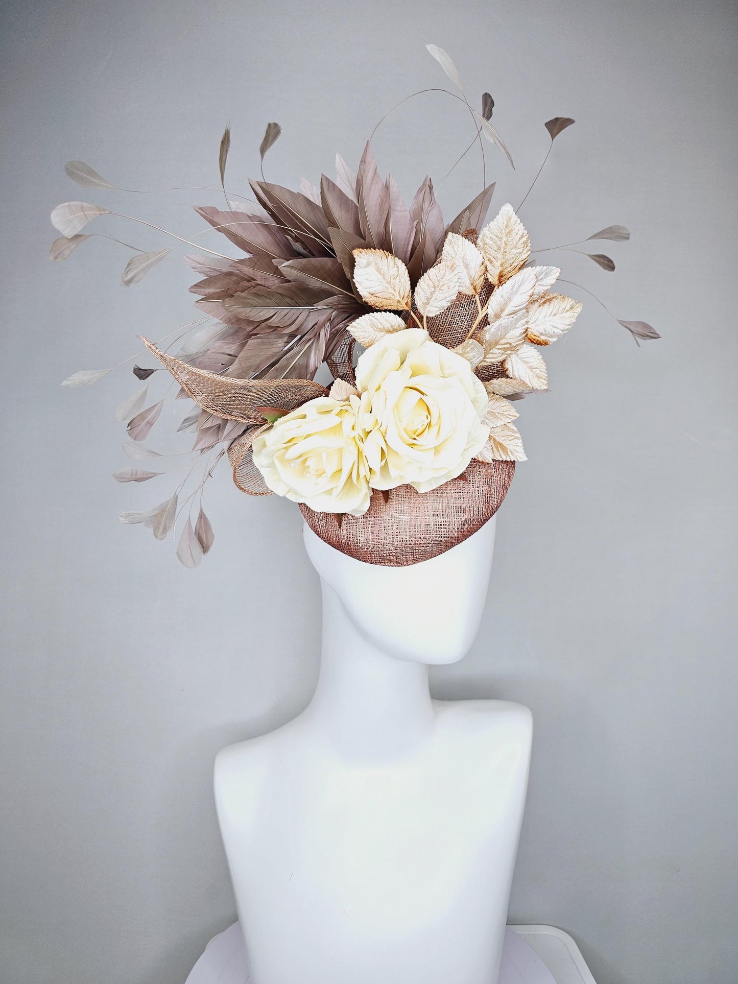 kentucky derby hat fascinator dusty pink sinamay,neutral taupe brown gray branching feathers,gold tan cream leaves,cream satin silk roses