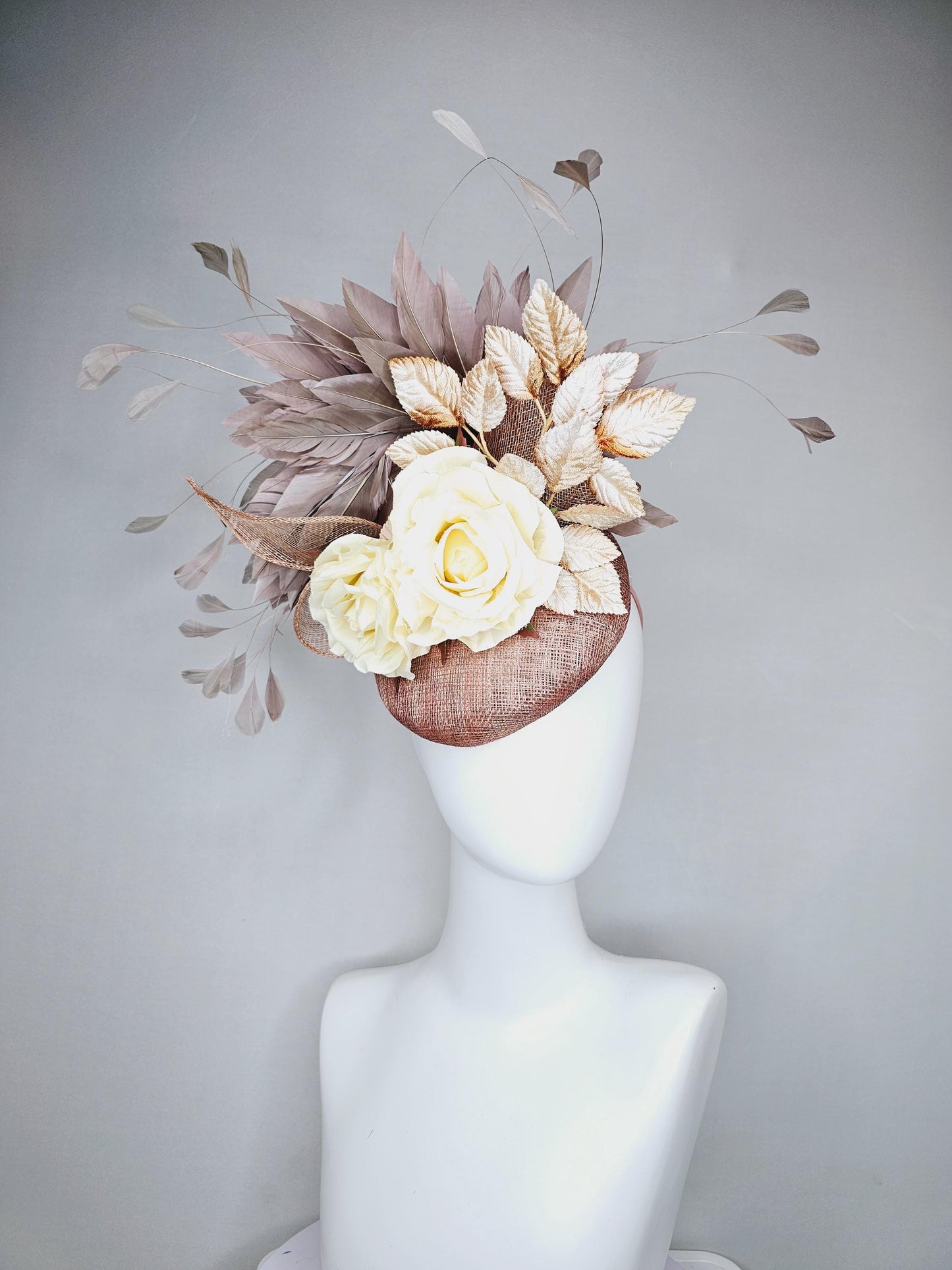 kentucky derby hat fascinator dusty pink sinamay,neutral taupe brown gray branching feathers,gold tan cream leaves,cream satin silk roses