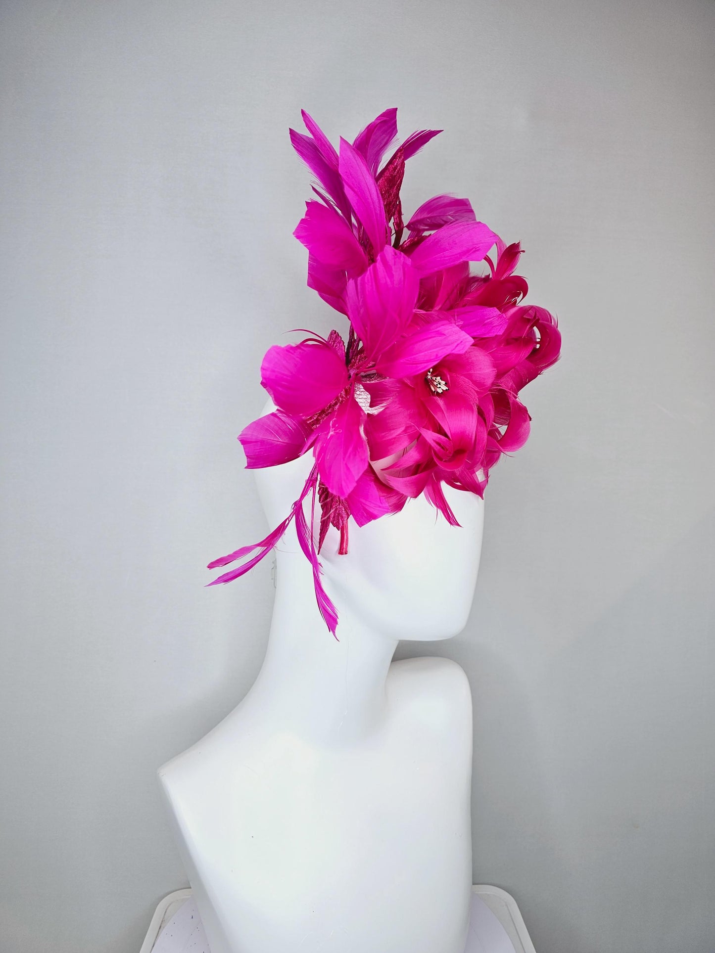 kentucky derby hat fascinator bright hot pink feather flowers with bright pink leaves and fuchsia pink feathers, thin headband