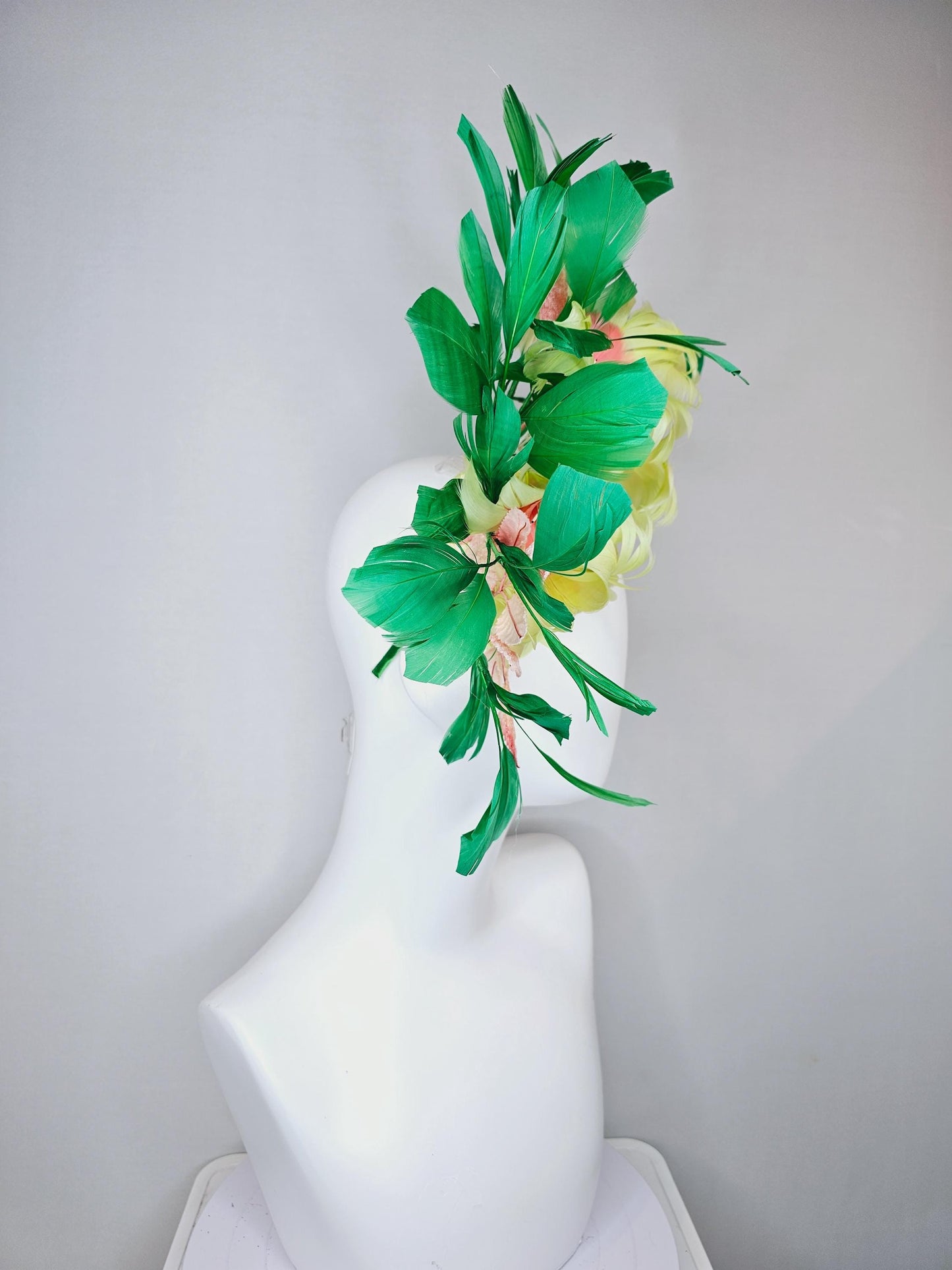 kentucky derby hat fascinator yellow feather flowers with ombre peach leaves and green feathers, thin headband