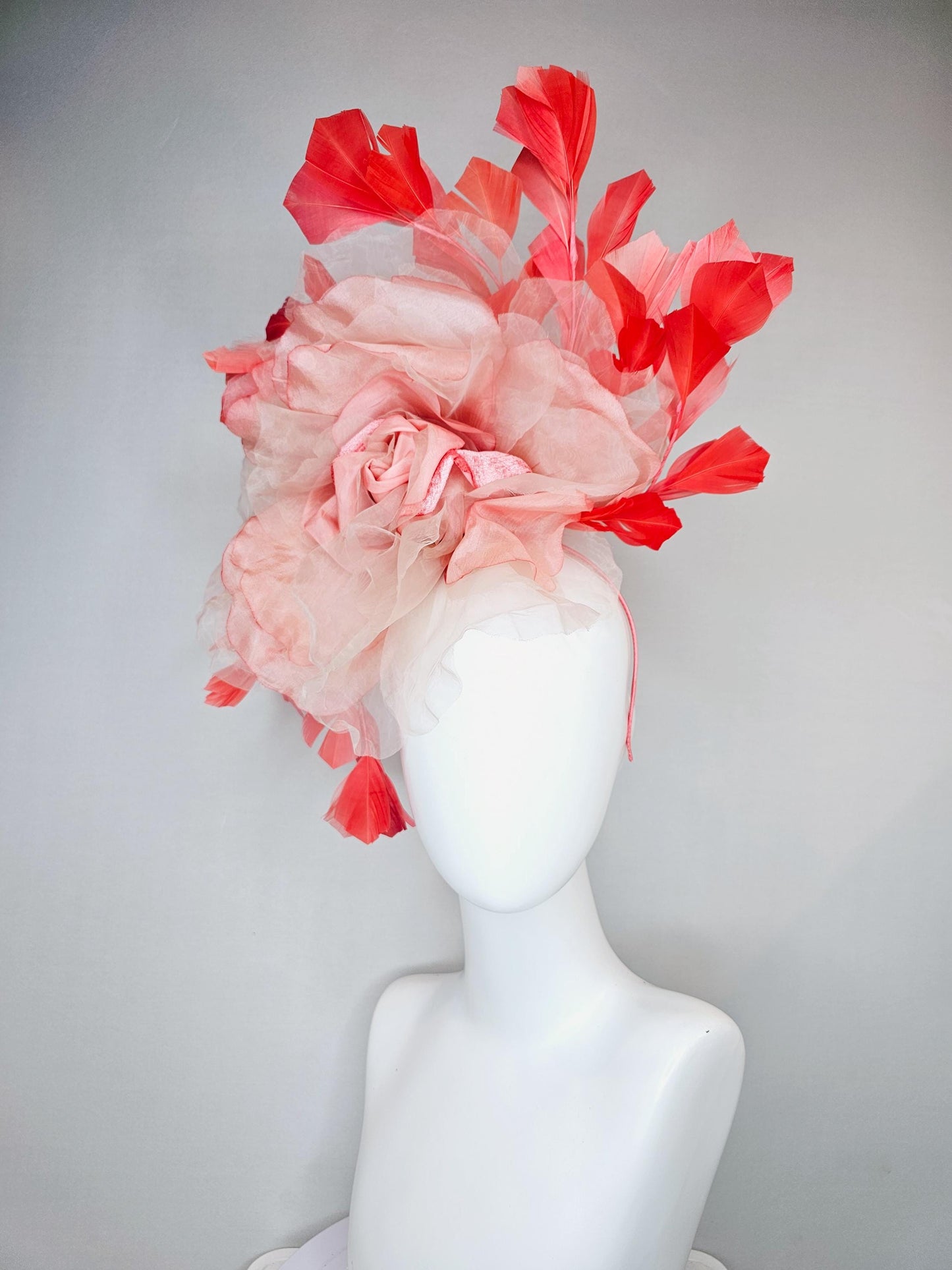 kentucky derby hat fascinator with large ombre peach pink organza flower and coral orange feathers, thin headband