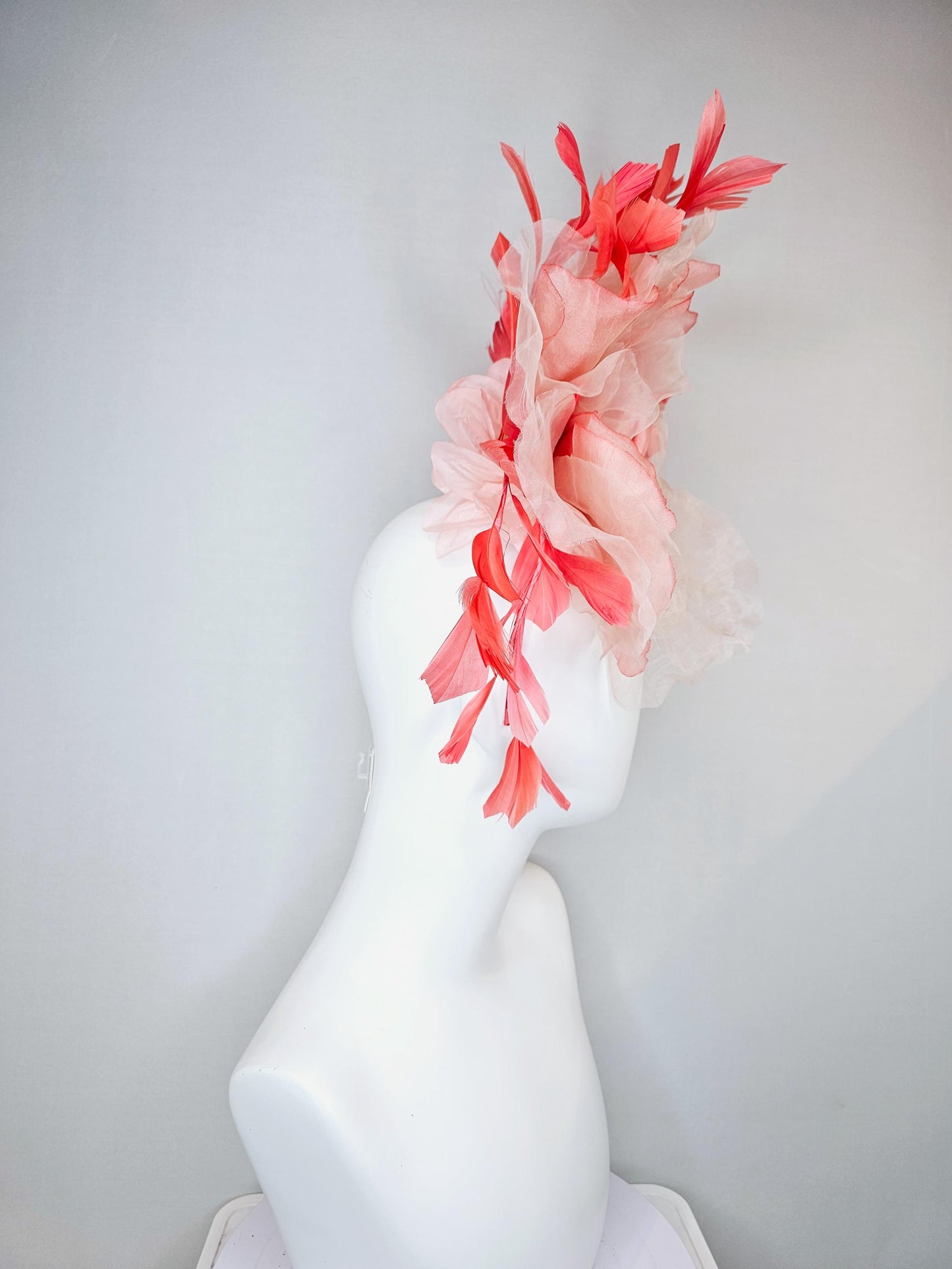 kentucky derby hat fascinator with large ombre peach pink organza flower and coral orange feathers, thin headband