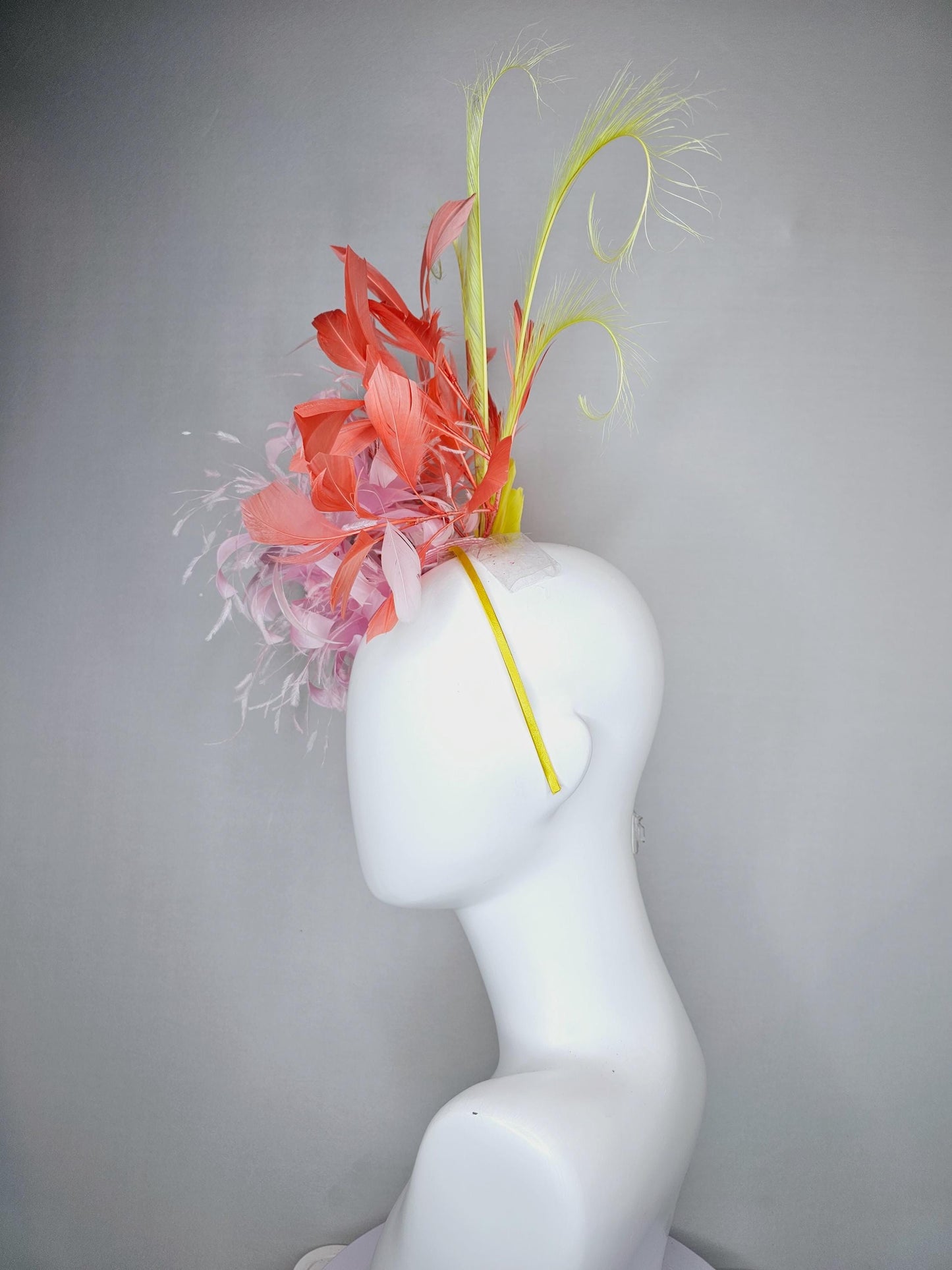 kentucky derby hat fascinator light pink fluffy feather flowers with coral orange feathers, yellow feathers, thin headband