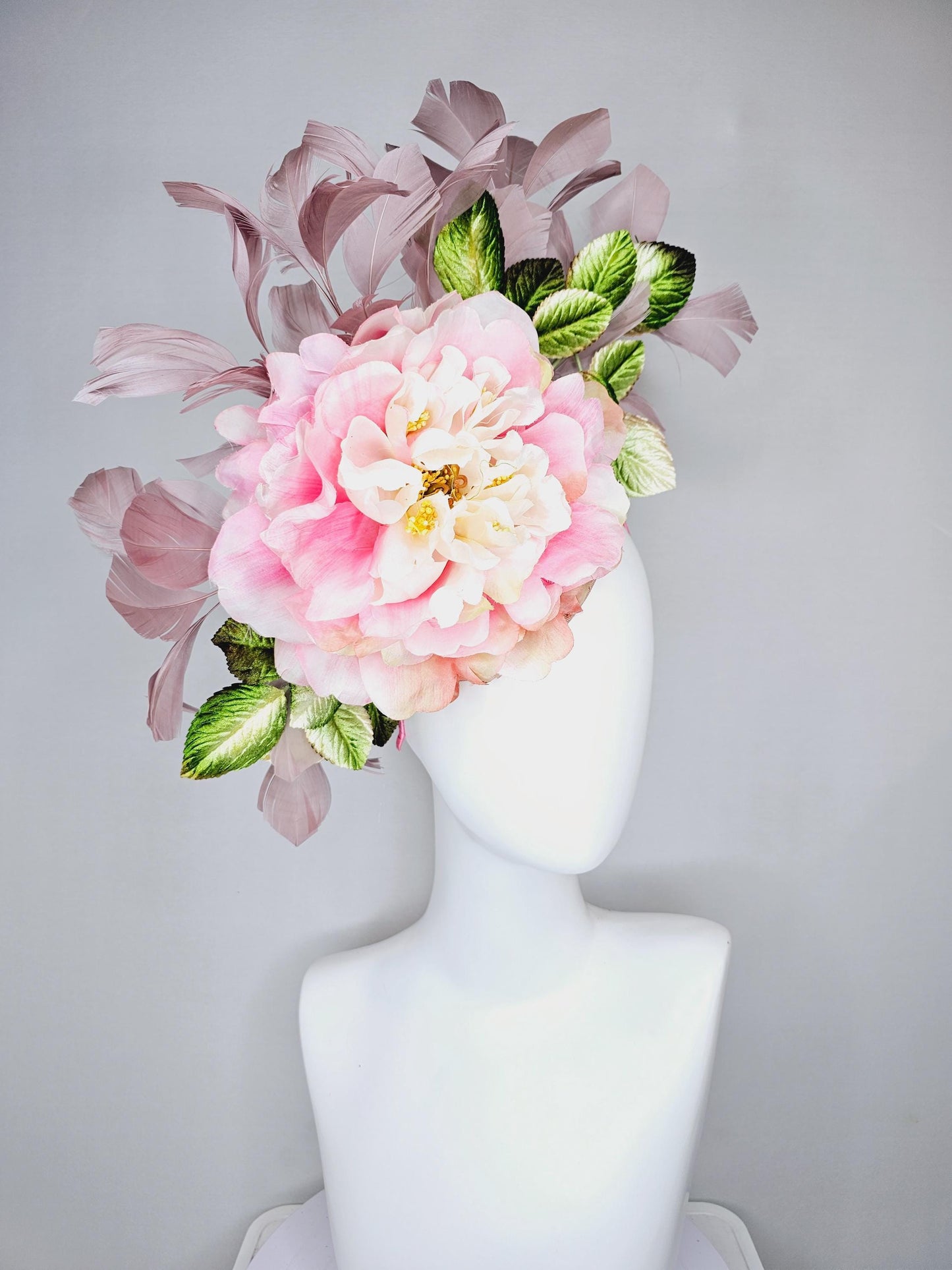 kentucky derby hat fascinator with large blush pink ombre satin silk flower with green ombre leaves and taupe feathers, thin headband