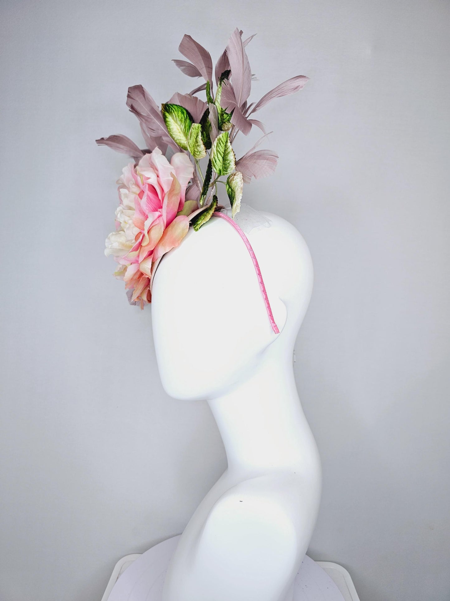 kentucky derby hat fascinator with large blush pink ombre satin silk flower with green ombre leaves and taupe feathers, thin headband