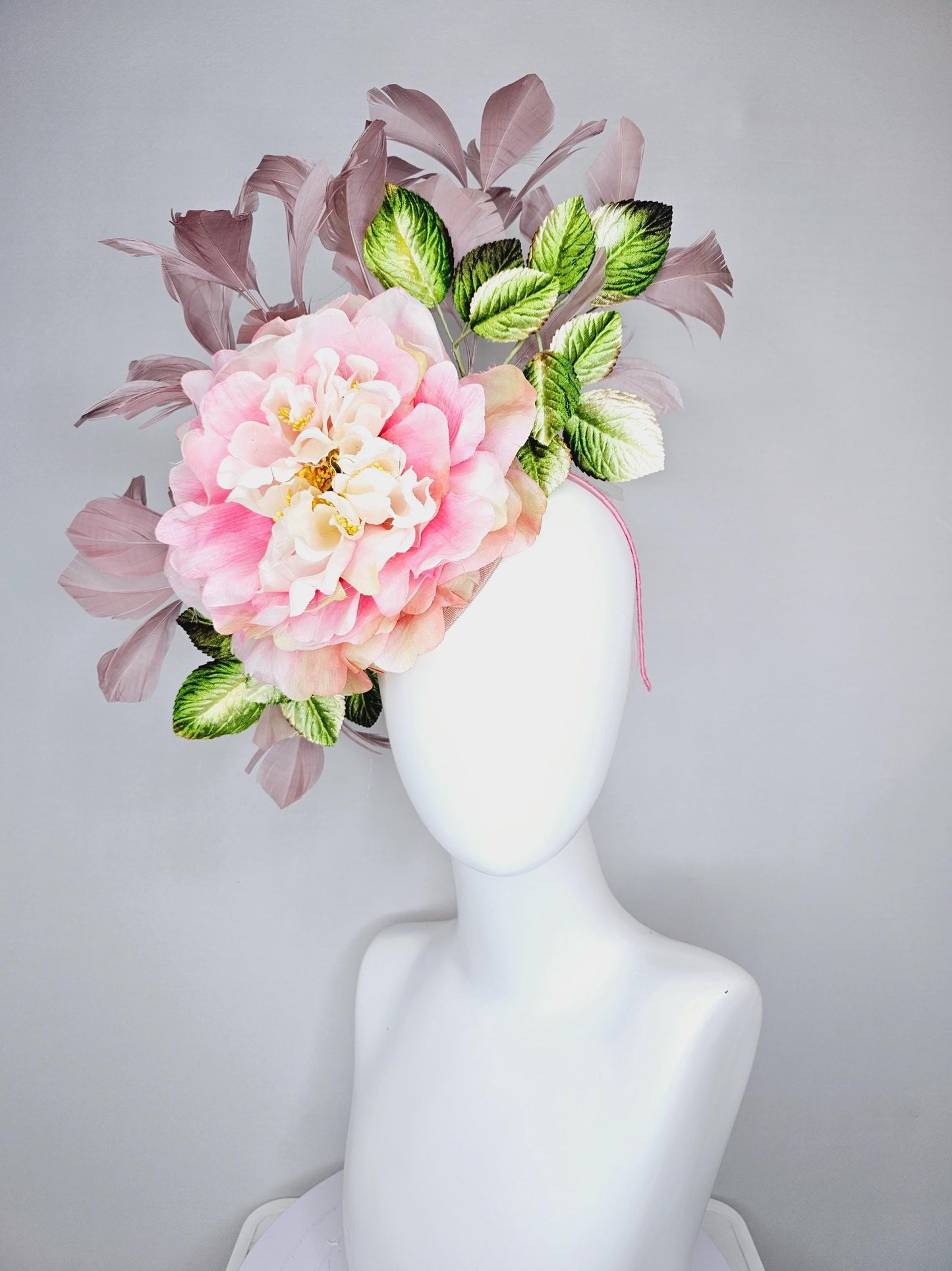 kentucky derby hat fascinator with large blush pink ombre satin silk flower with green ombre leaves and taupe feathers, thin headband