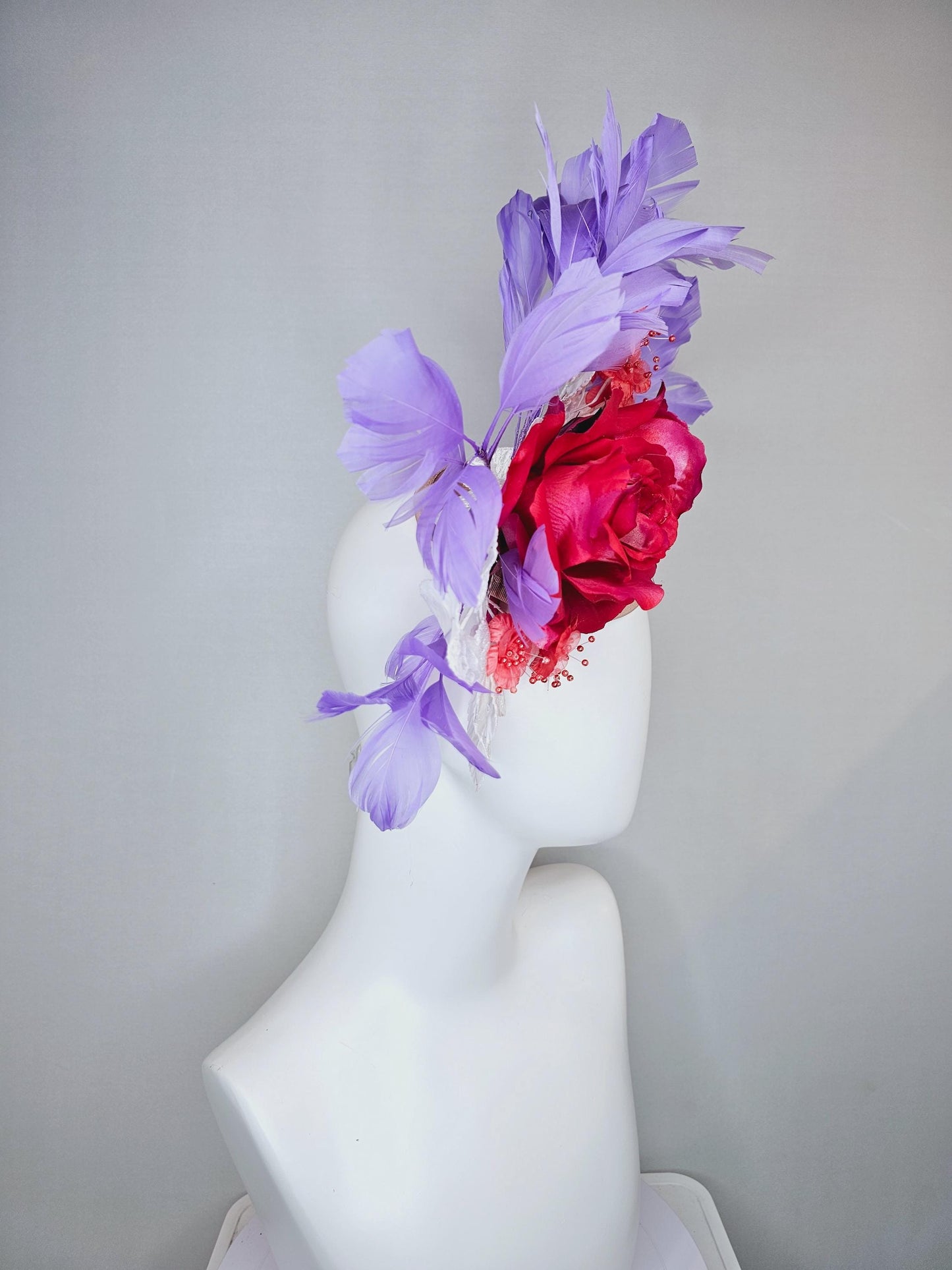 kentucky derby hat fascinator champagne satin,red satin rose flowers,small red coral flowers,white leaves,light purple lavender feathers