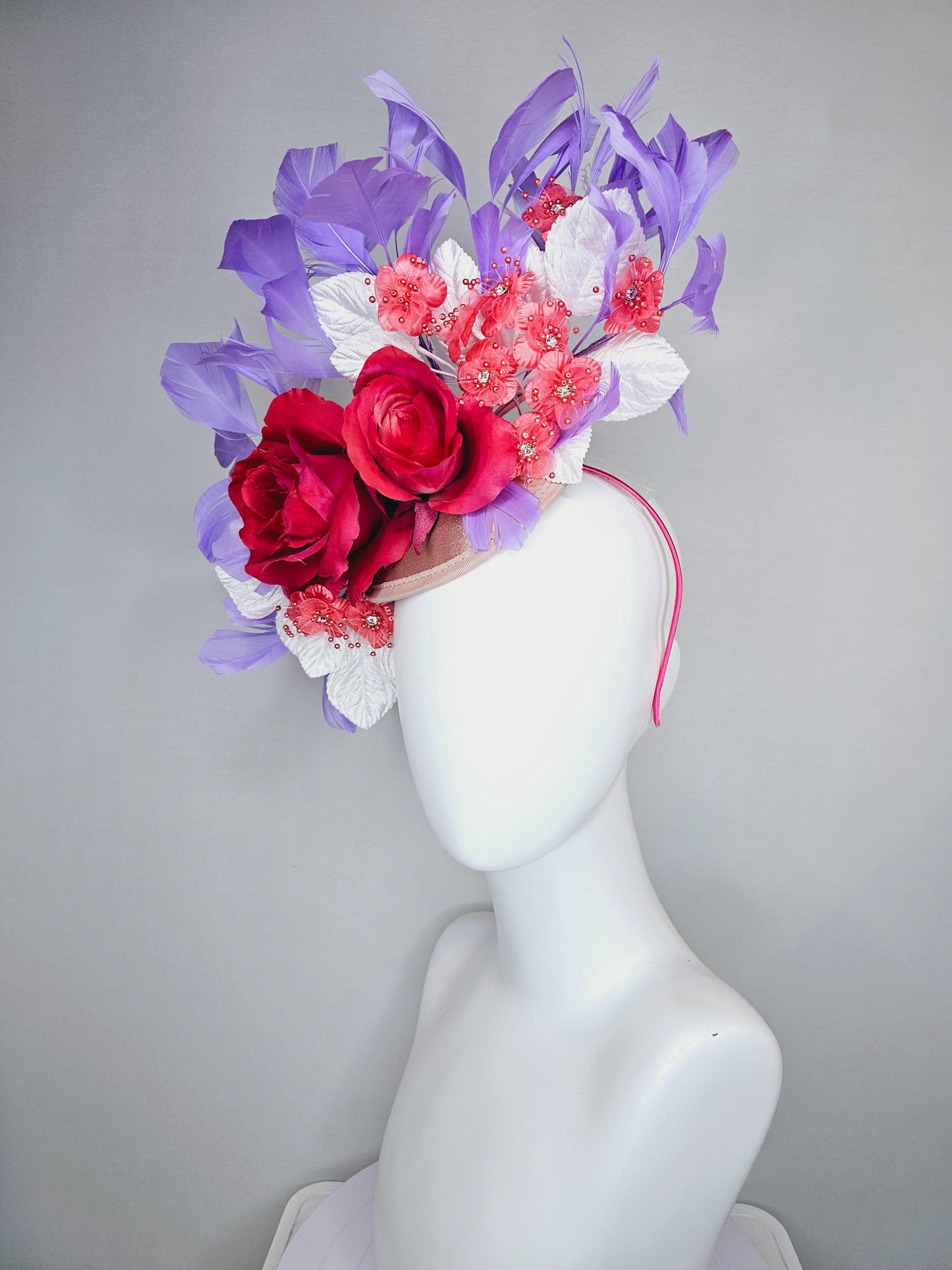 kentucky derby hat fascinator champagne satin,red satin rose flowers,small red coral flowers,white leaves,light purple lavender feathers