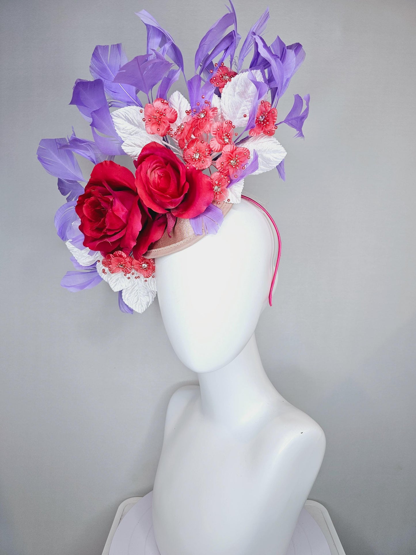 kentucky derby hat fascinator champagne satin,red satin rose flowers,small red coral flowers,white leaves,light purple lavender feathers