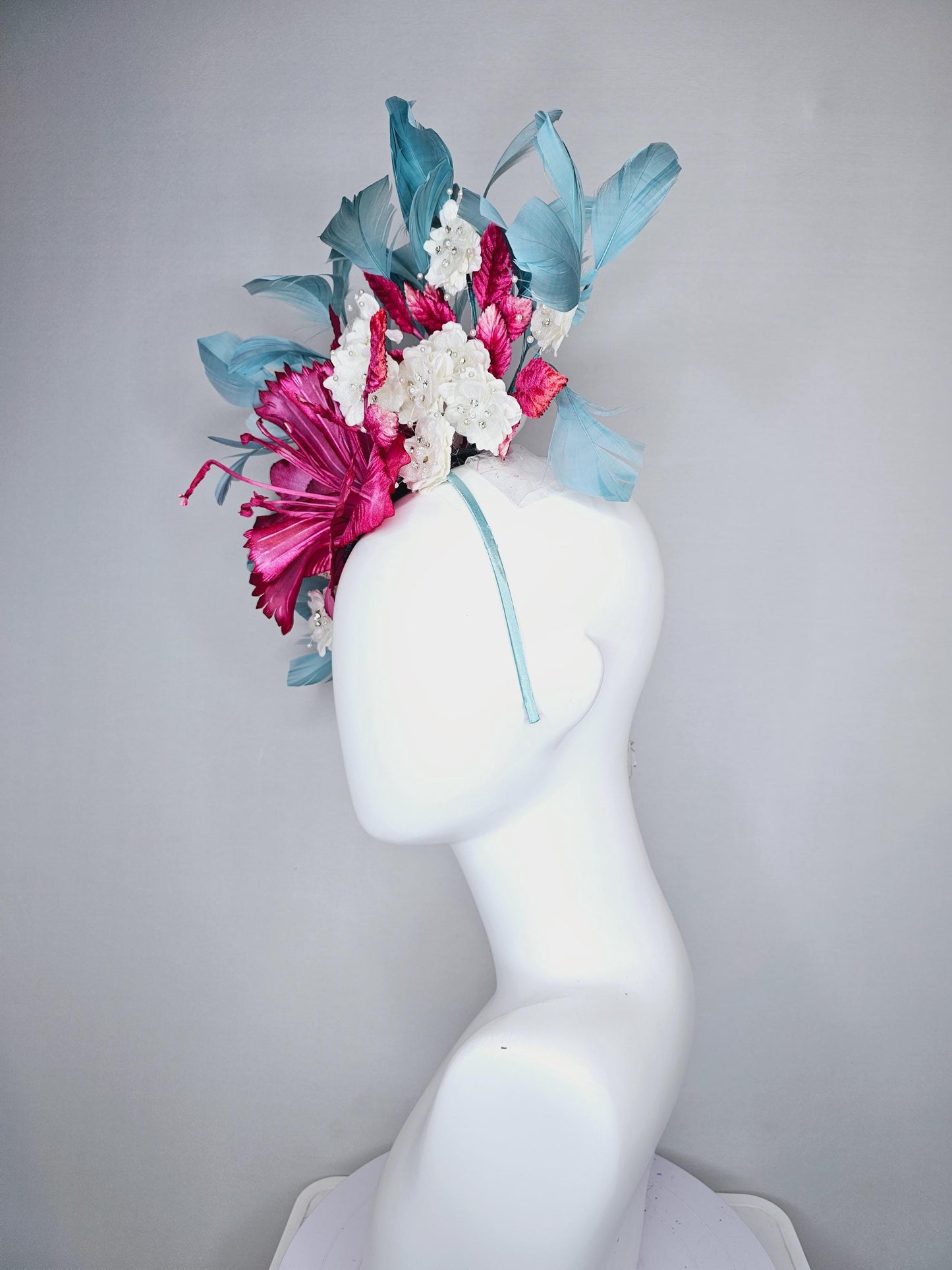 kentucky derby hat fascinator black sinamay,pink fuchsia satin flower,small white flowers with crystal pearl,pink leaves,teal blue feathers