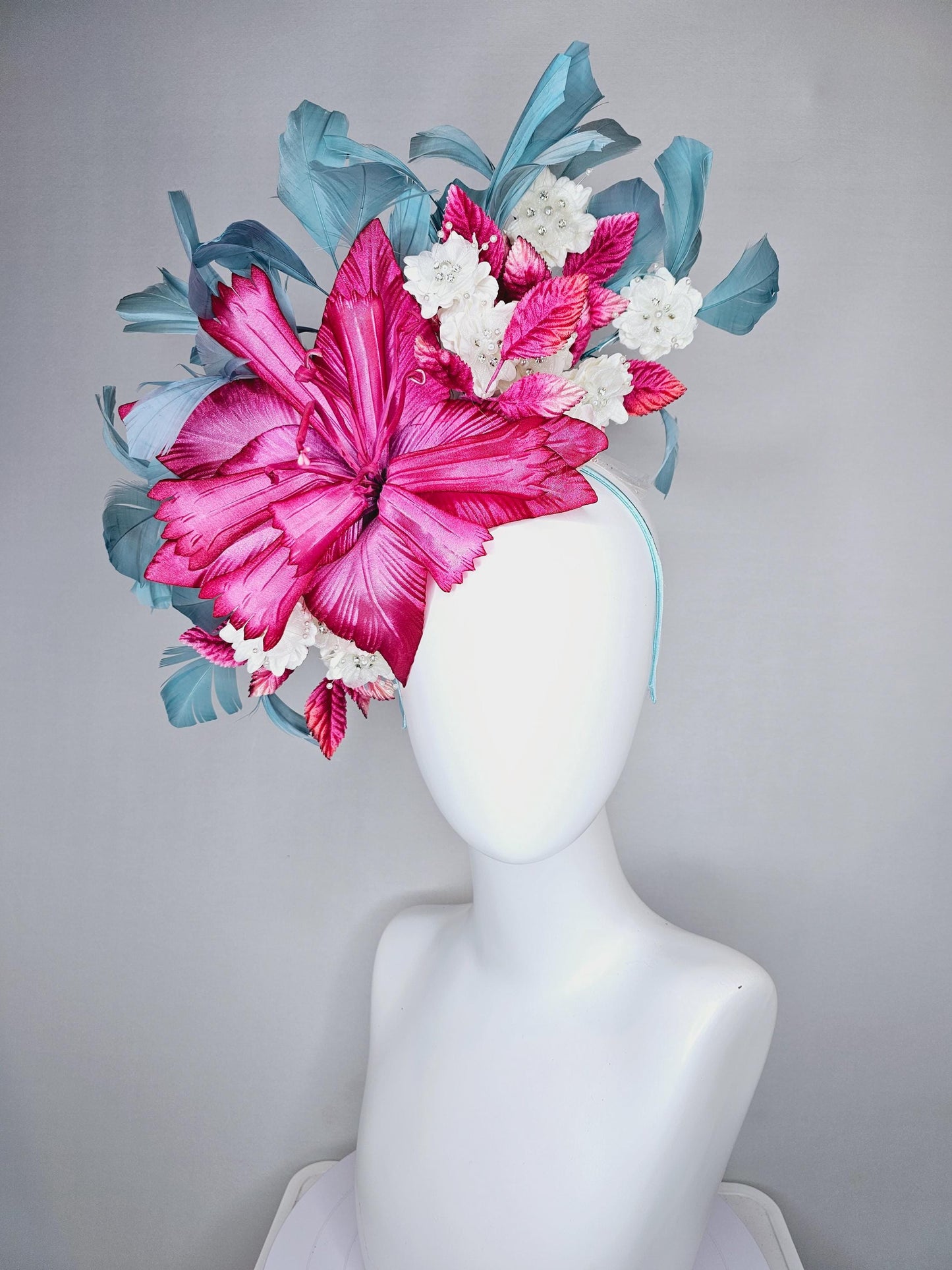 kentucky derby hat fascinator black sinamay,pink fuchsia satin flower,small white flowers with crystal pearl,pink leaves,teal blue feathers