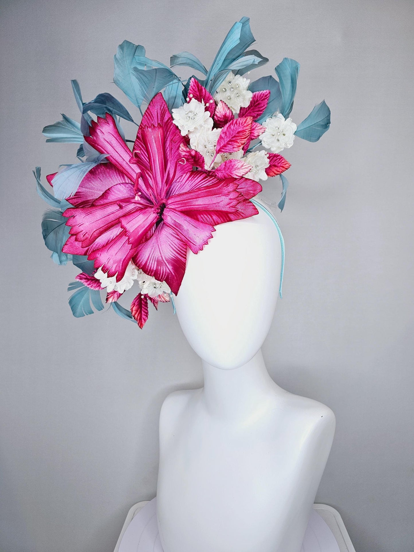 kentucky derby hat fascinator black sinamay,pink fuchsia satin flower,small white flowers with crystal pearl,pink leaves,teal blue feathers