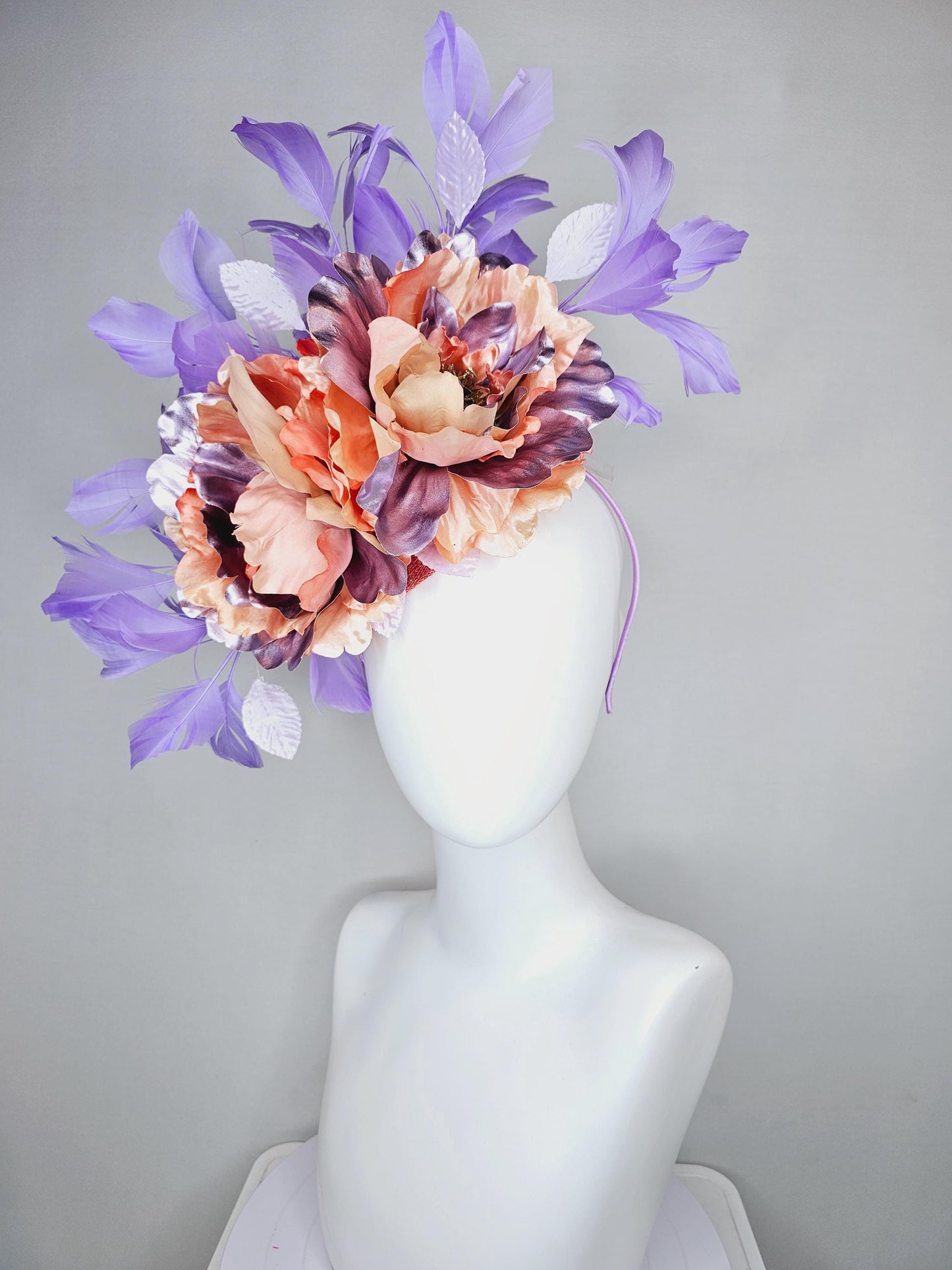 kentucky derby hat fascinator peach sinamay,coral peach orange purple lavender satin flowers,light lavender leaves,purple lavender feathers