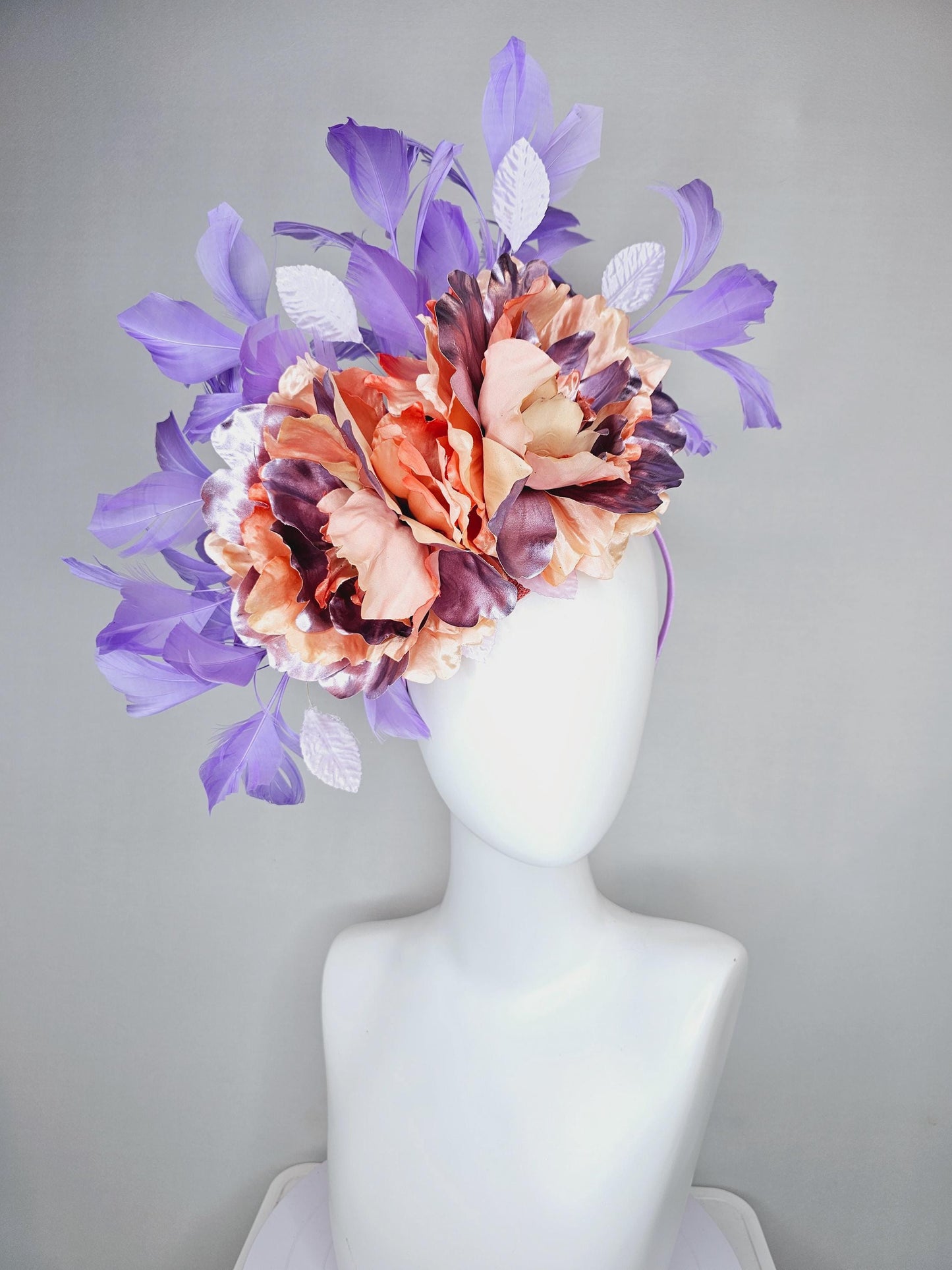 kentucky derby hat fascinator peach sinamay,coral peach orange purple lavender satin flowers,light lavender leaves,purple lavender feathers