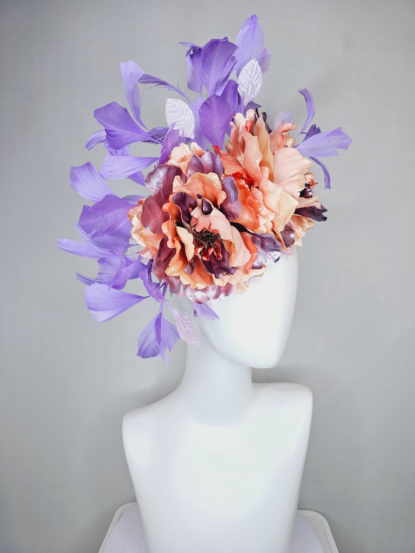 kentucky derby hat fascinator peach sinamay,coral peach orange purple lavender satin flowers,light lavender leaves,purple lavender feathers