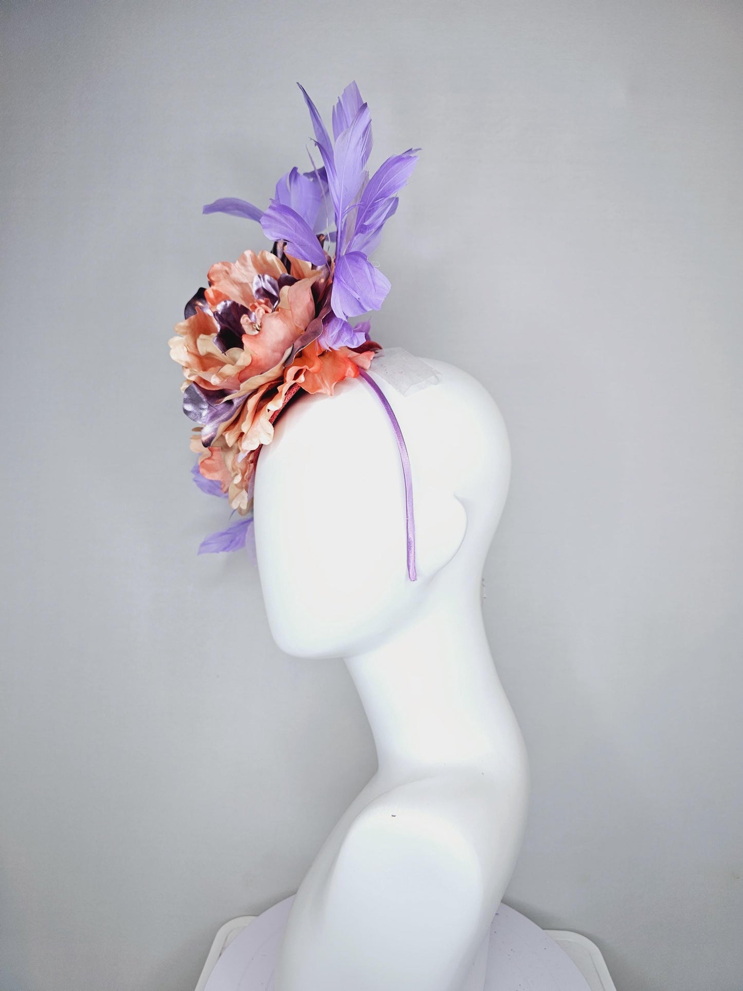 kentucky derby hat fascinator peach sinamay,coral peach orange purple lavender satin flowers,light lavender leaves,purple lavender feathers