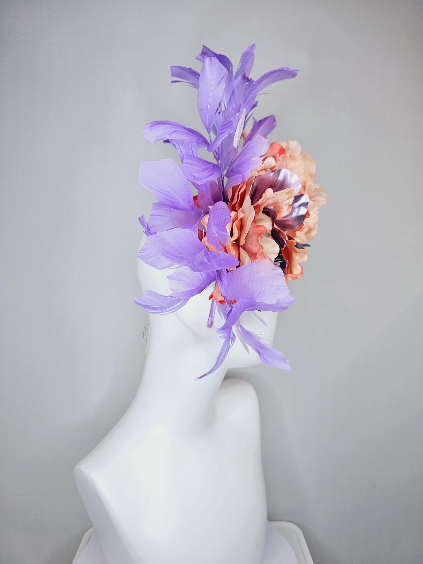 kentucky derby hat fascinator peach sinamay,coral peach orange purple lavender satin flowers,light lavender leaves,purple lavender feathers