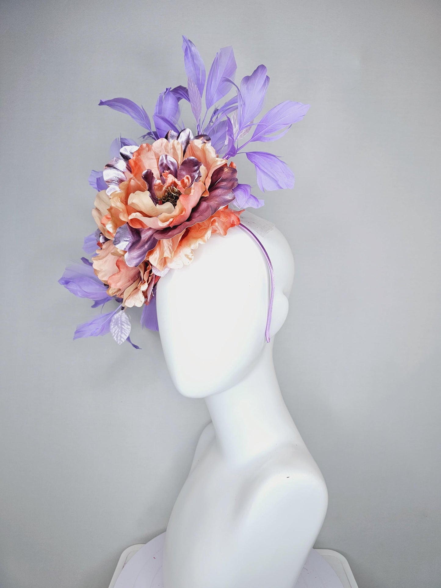 kentucky derby hat fascinator peach sinamay,coral peach orange purple lavender satin flowers,light lavender leaves,purple lavender feathers