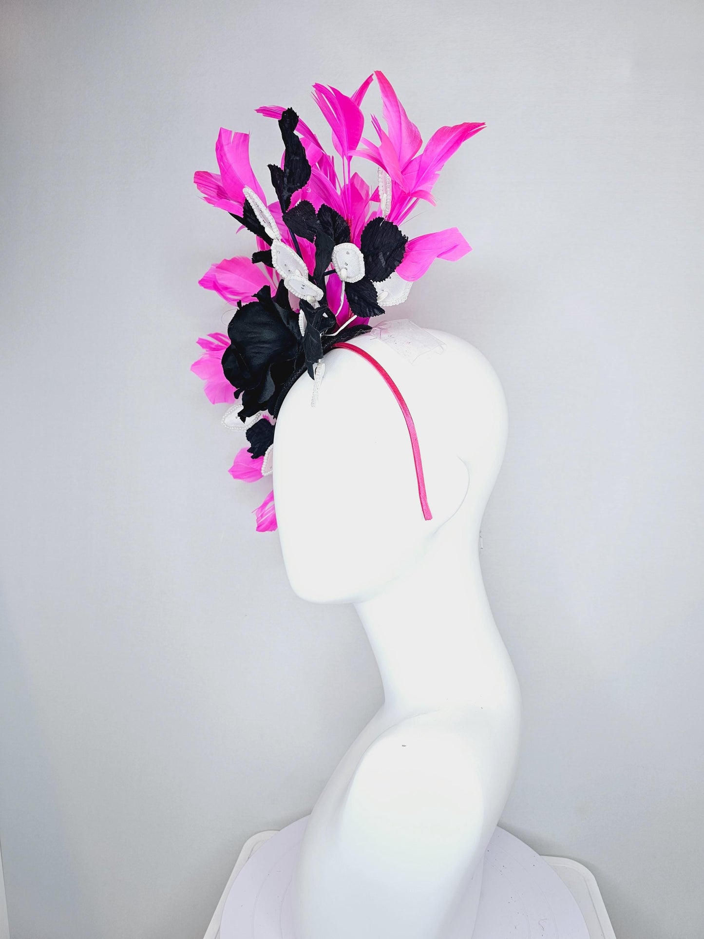 kentucky derby hat fascinator black sinamay,black satin rose flower, white leaves sequin pearl edges and black leaves, pink fuchsia feathers