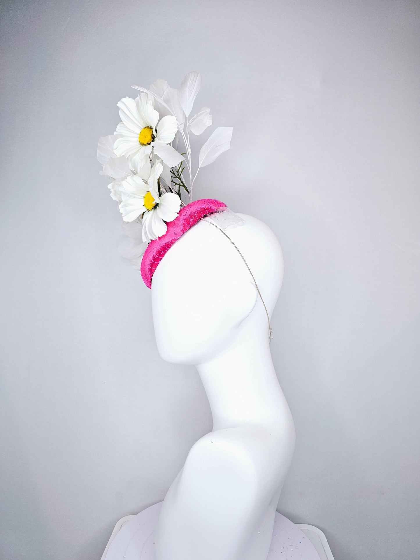 kentucky derby hat fascinator pink fuchsia satin with netting, white satin flowers with yellow center, green stems, white ivory feathers