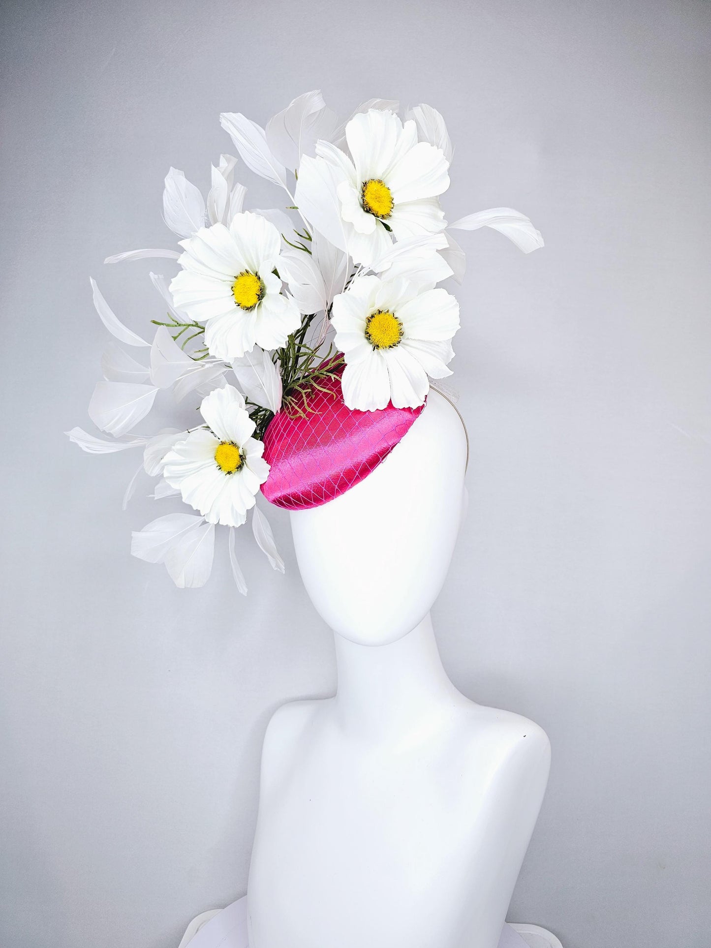 kentucky derby hat fascinator pink fuchsia satin with netting, white satin flowers with yellow center, green stems, white ivory feathers