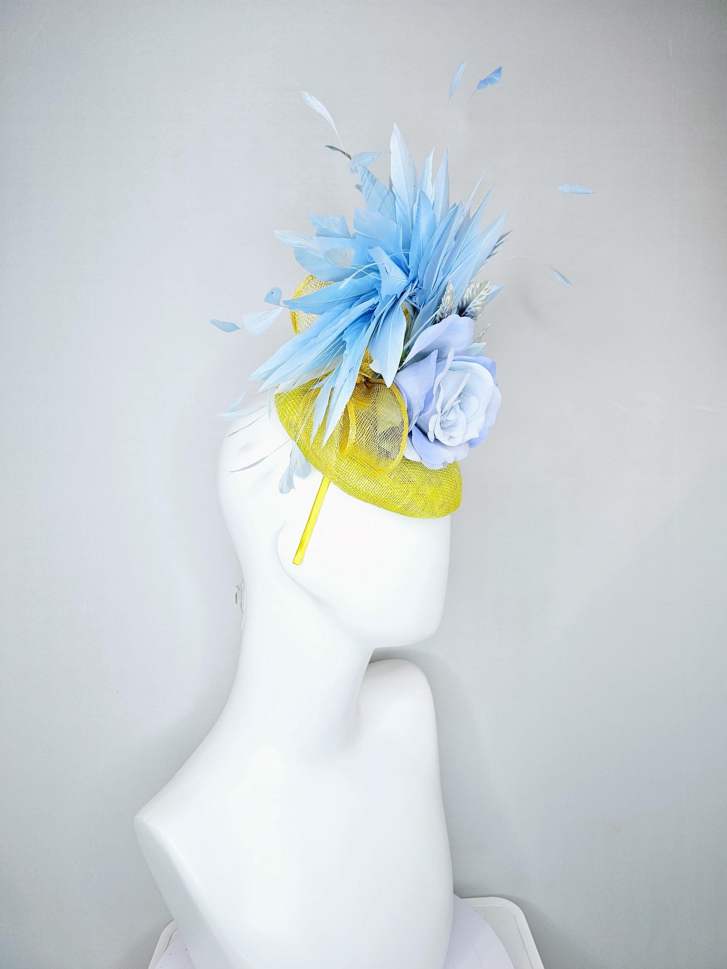 kentucky derby hat fascinator yellow sinamay, light baby blue satin rose flower, ombre navy blue leaves, sky blue branching feathers