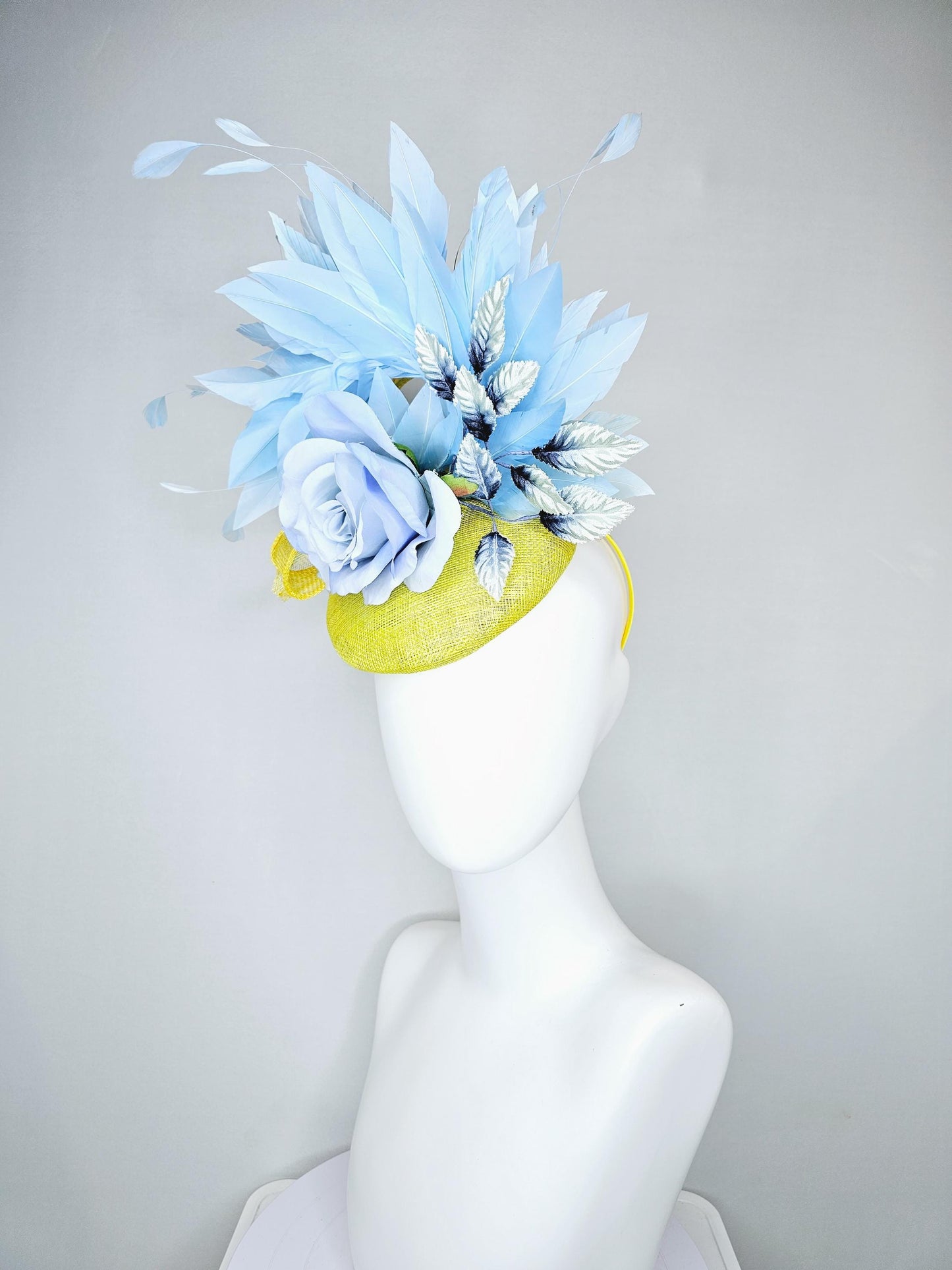 kentucky derby hat fascinator yellow sinamay, light baby blue satin rose flower, ombre navy blue leaves, sky blue branching feathers