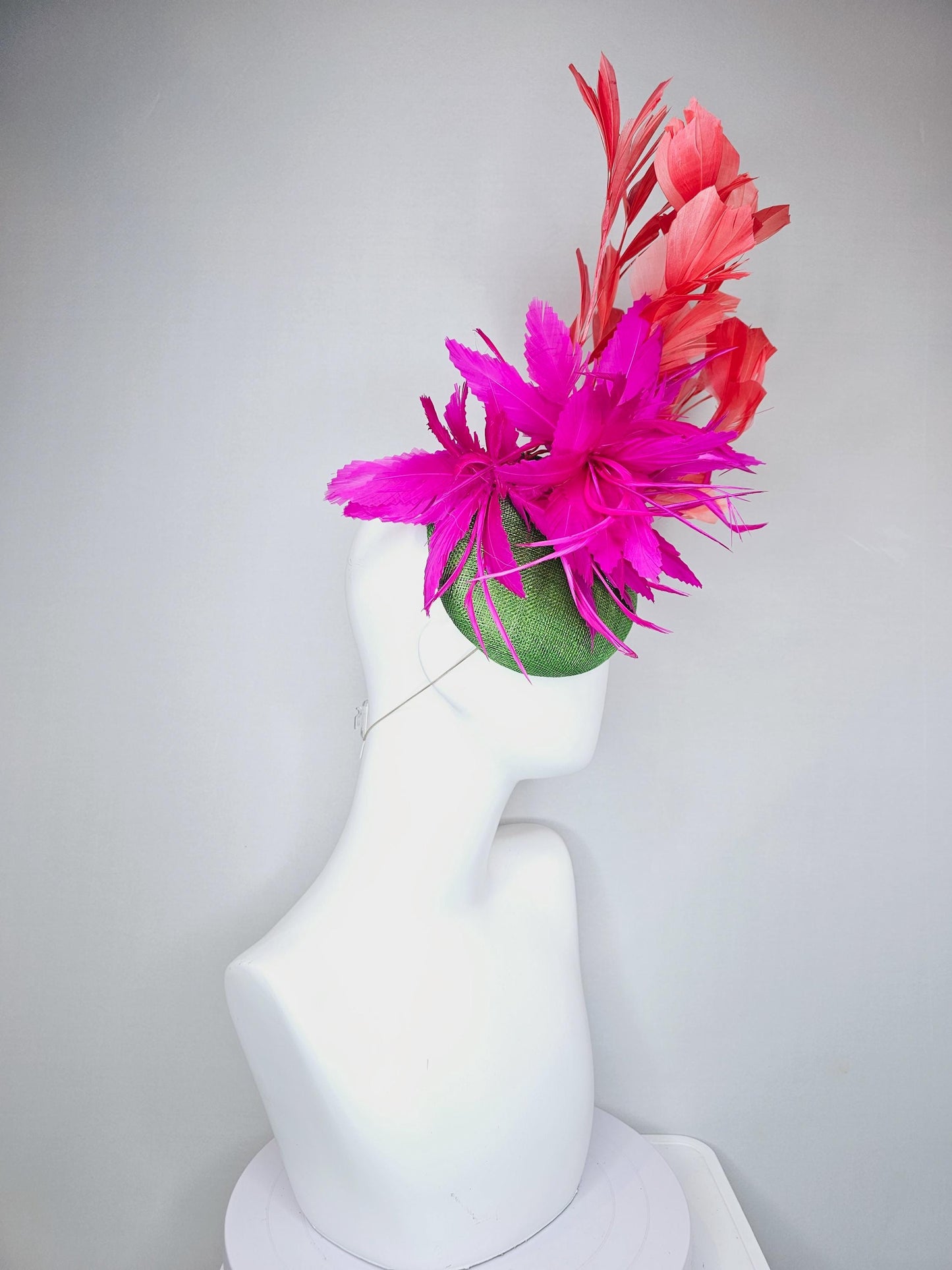 kentucky derby hat fascinator lime green sinamay base with bright pink fuchsia zigzag feather flowers, coral orange branching feathers