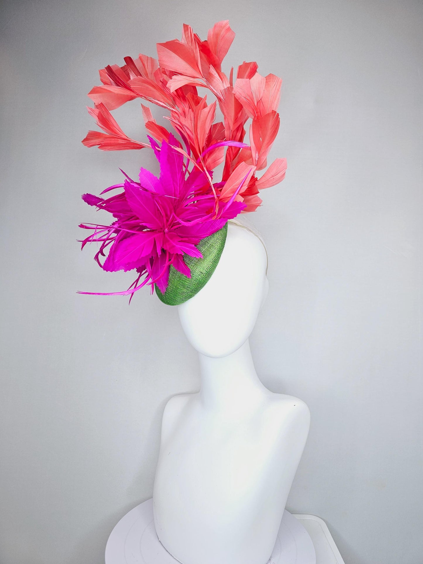 kentucky derby hat fascinator lime green sinamay base with bright pink fuchsia zigzag feather flowers, coral orange branching feathers