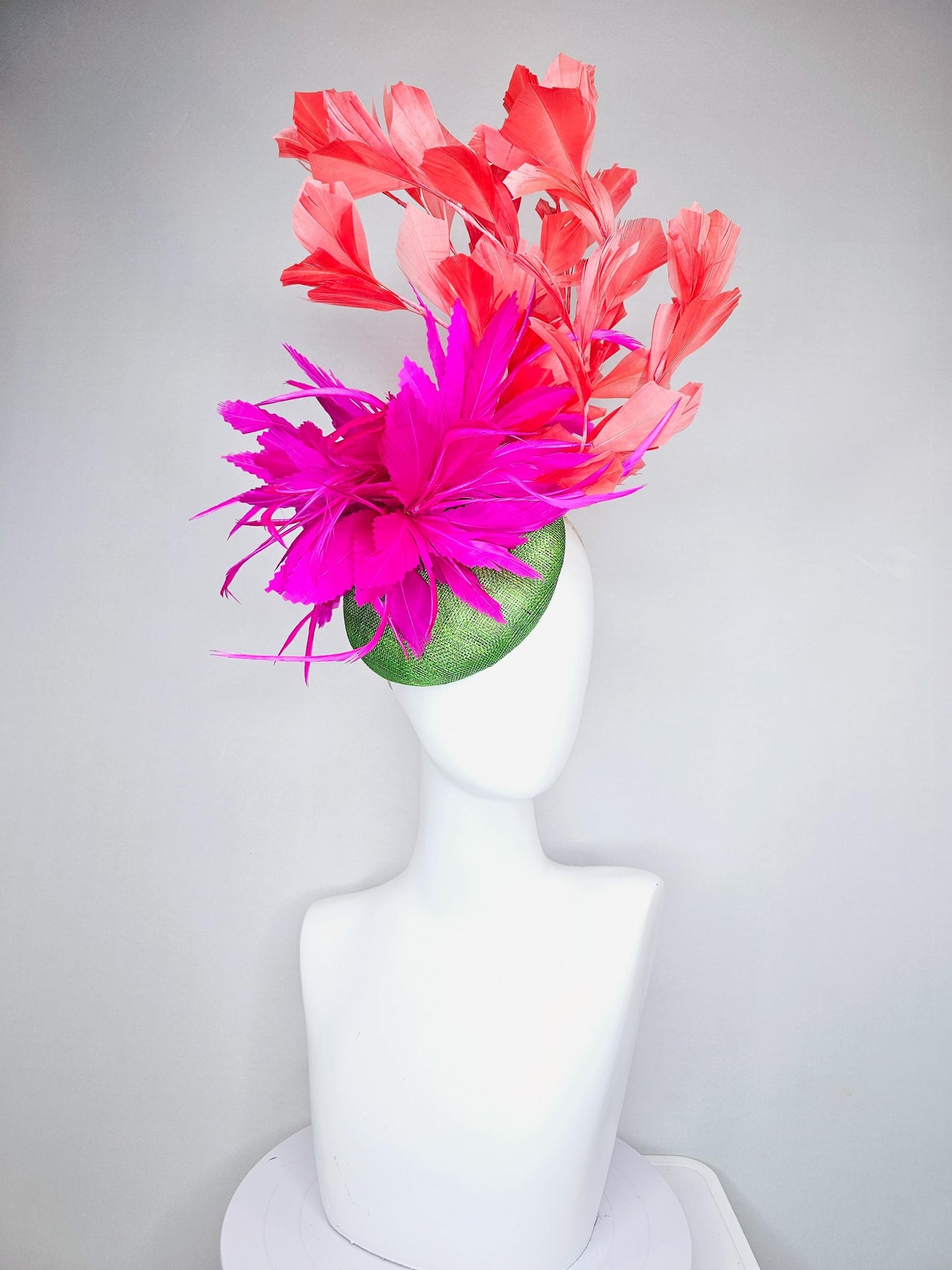 kentucky derby hat fascinator lime green sinamay base with bright pink fuchsia zigzag feather flowers, coral orange branching feathers